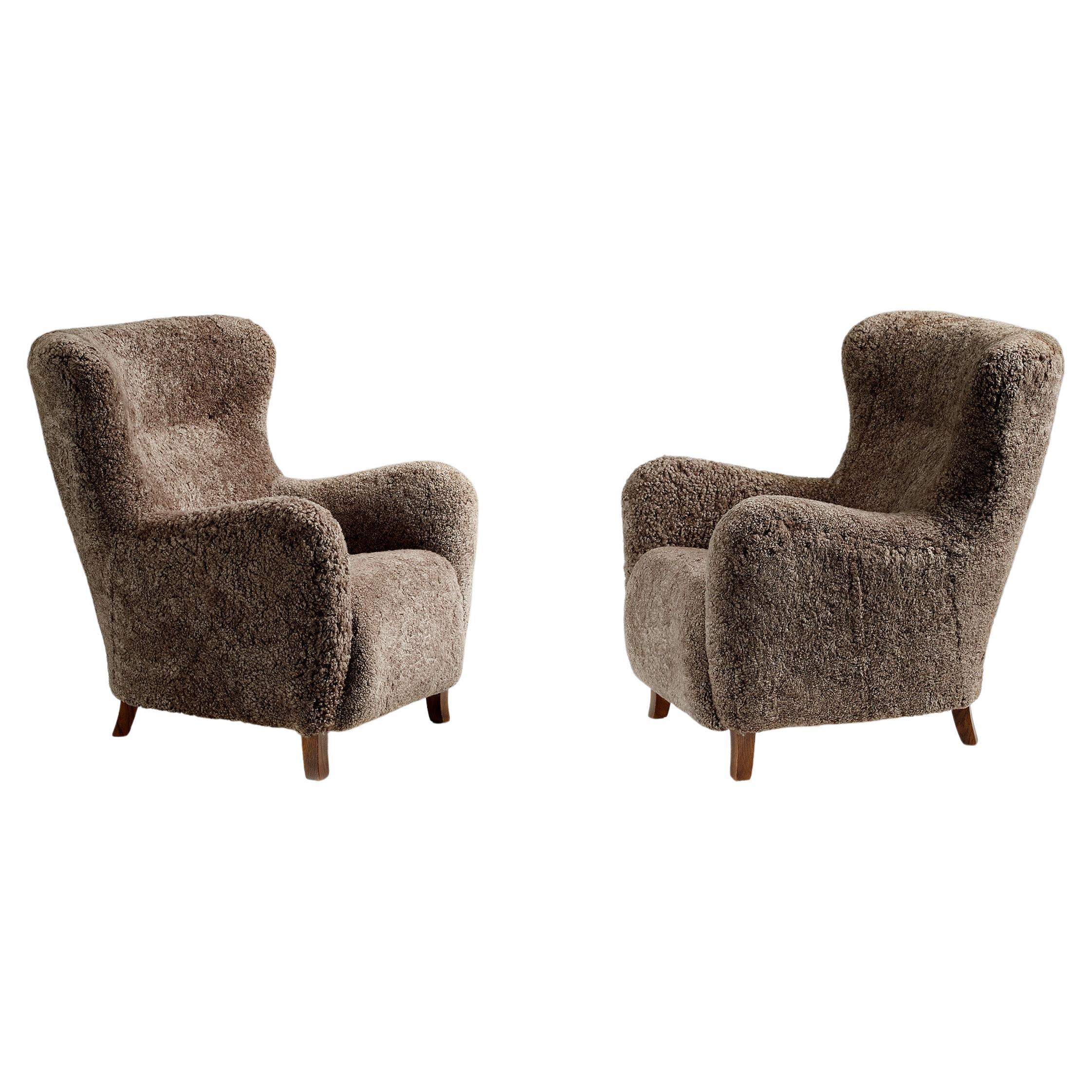 Pair of Custom Made Sheepskin Wing Chairs For Sale