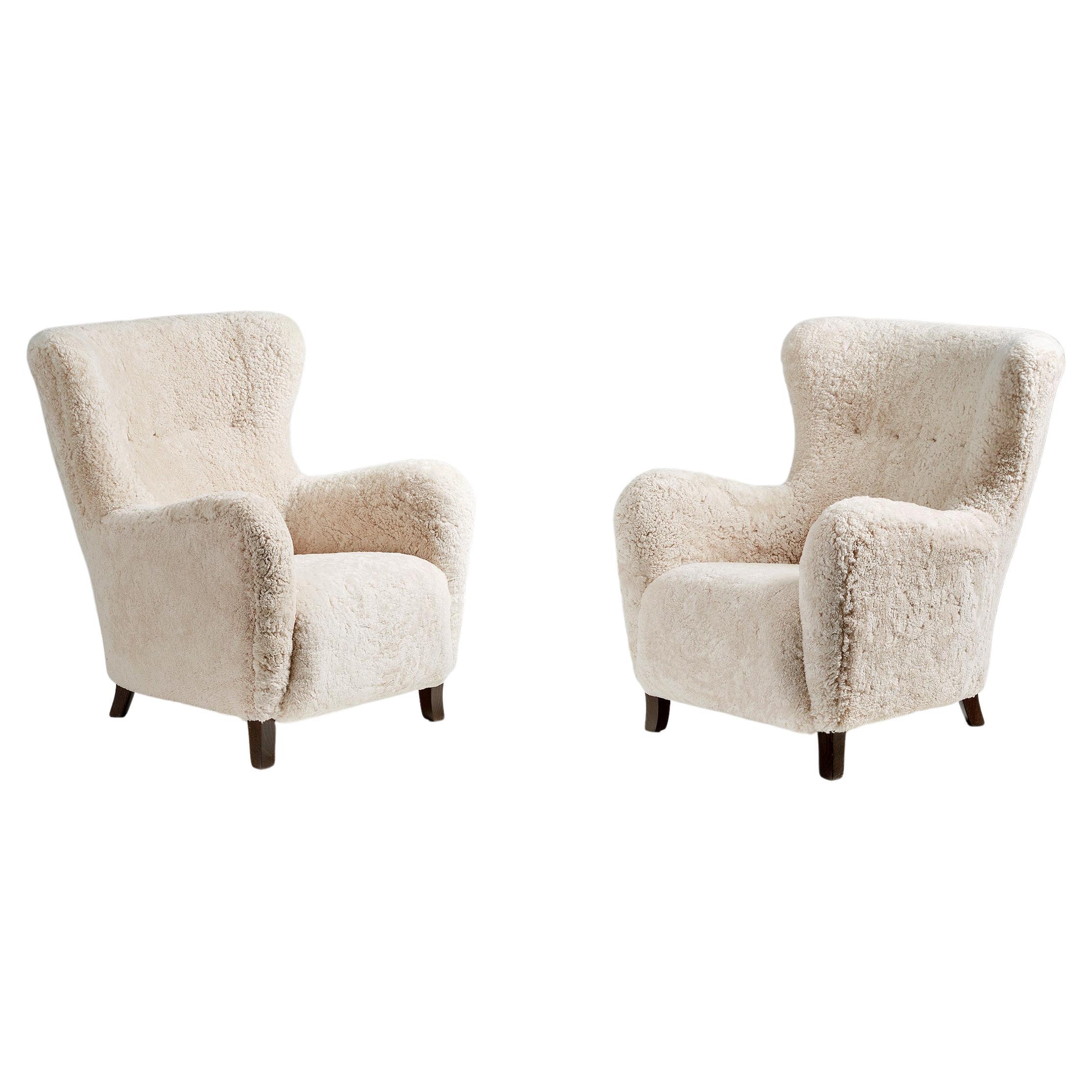 Pair of Custom Made Sheepskin Wing Chairs For Sale