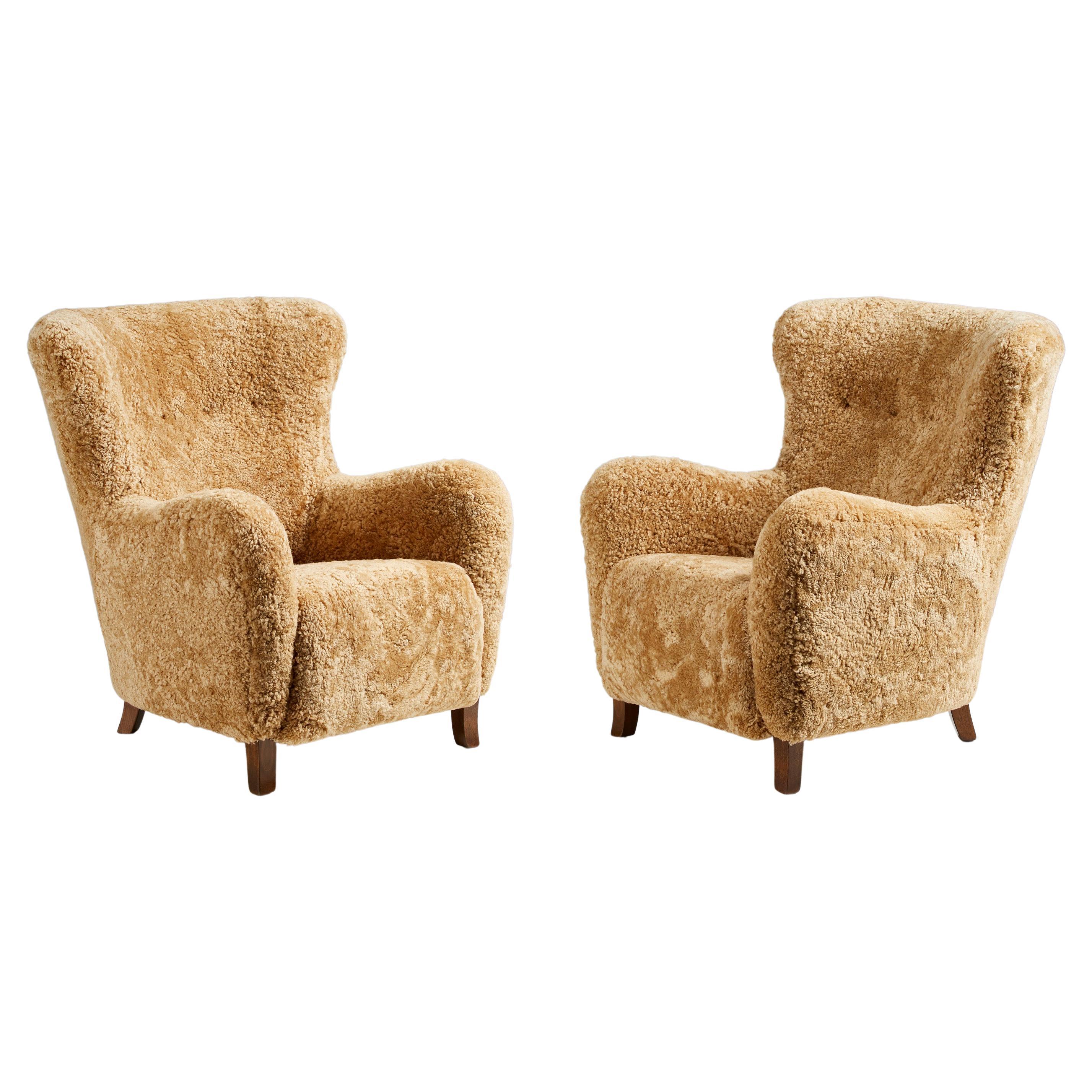 Pair of Custom Made Sheepskin Wing Chairs For Sale