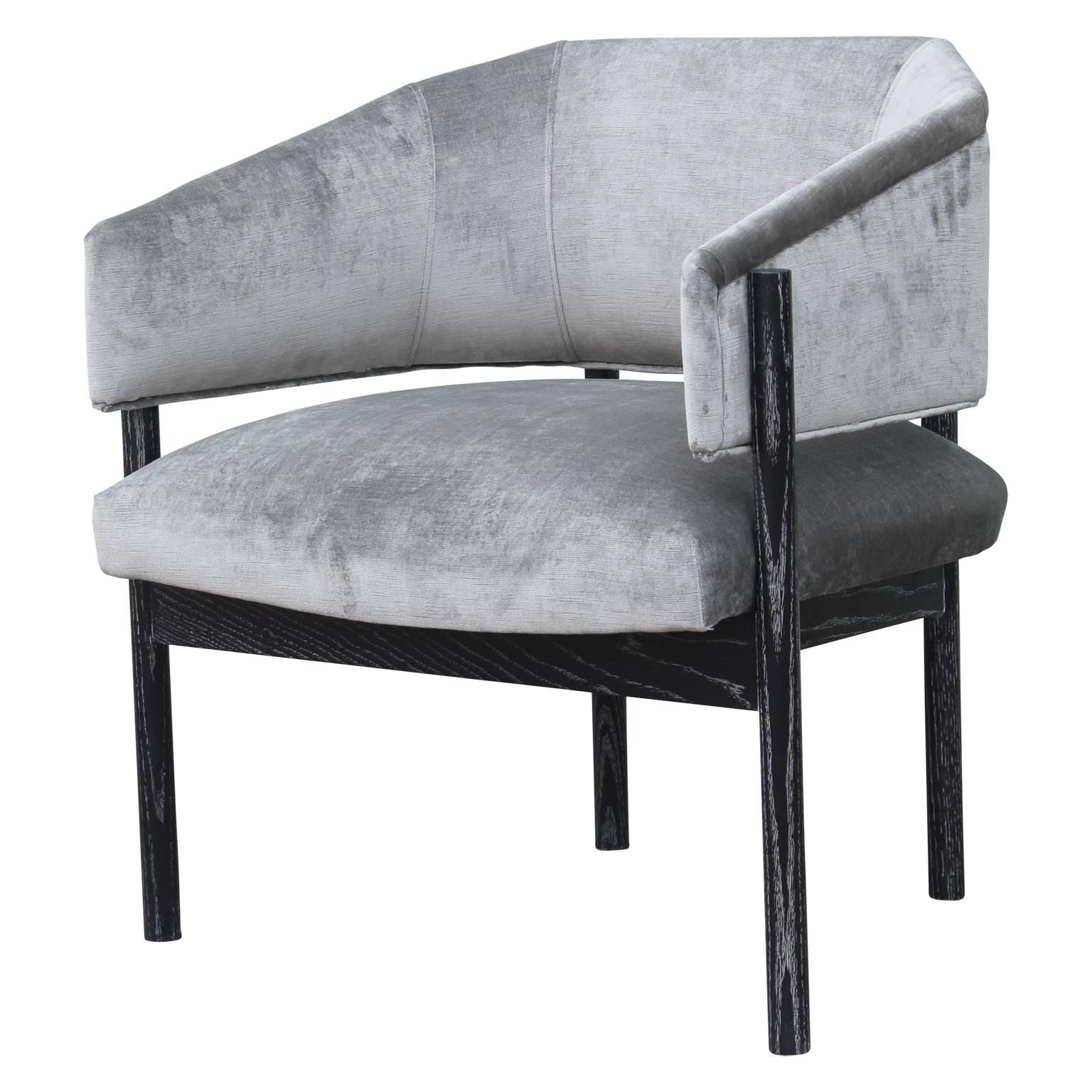 Pair of custom-made velvet and black cerused lounge chairs.