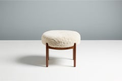 Pair of Custom Made Walnut & Sheepskin Esko Ottomans