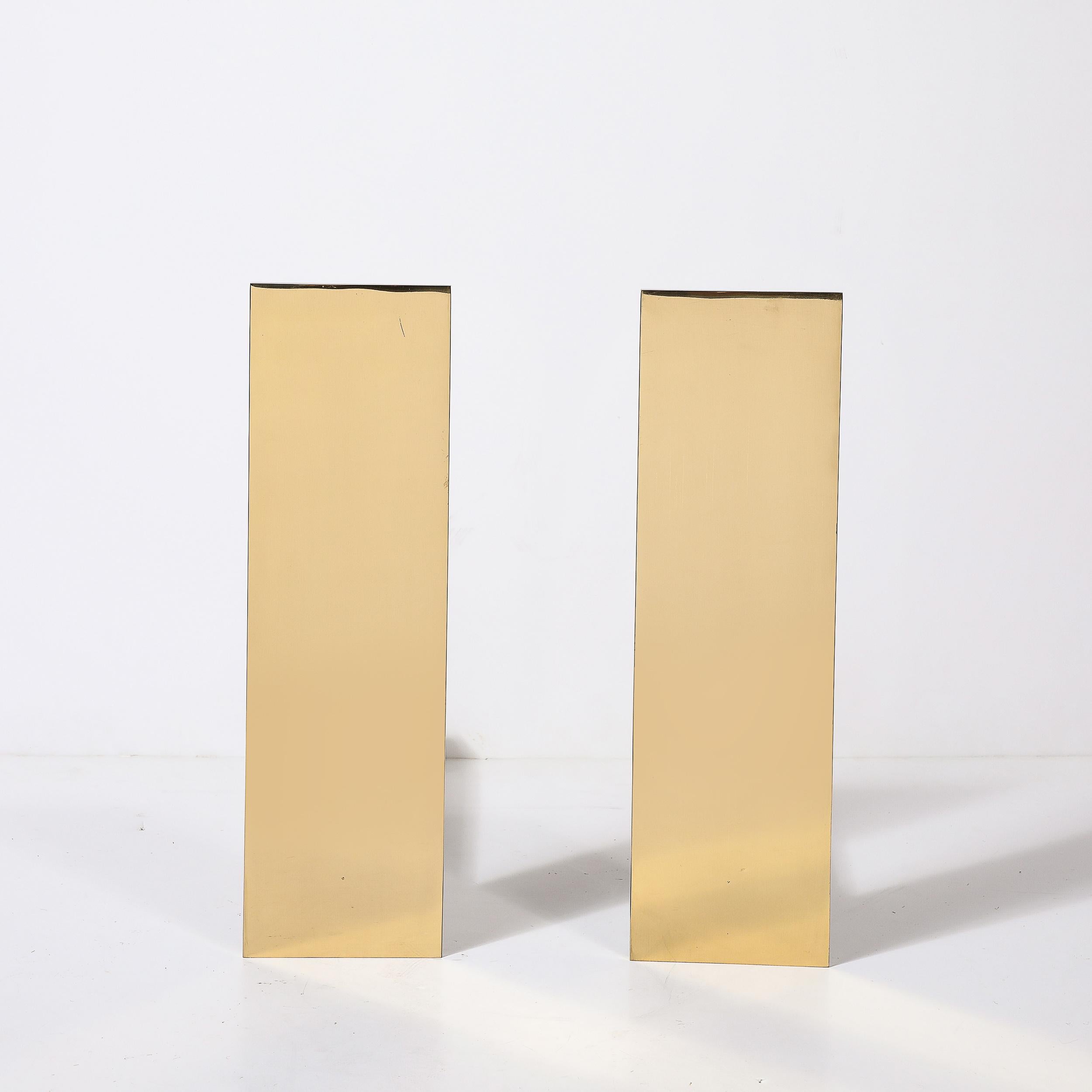 This ultra chic pair of custom andirons feature a minimalistic vertical rectangular front panel displayed in polished brass. They are fully customizable in terms of the dimensions and finish options include polished, brushed or antiqued nickel or