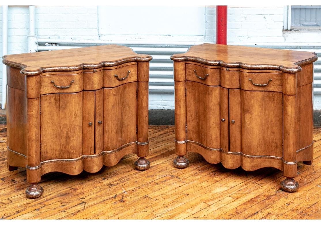 Good heavy construction with classic Dutch serpentine forms on the top and front. The front with a confirming serpentine slide pull over the long apron drawer. Below is a double door cabinet, raised on bun feet in front and square legs in back. With
