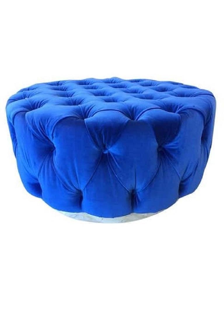 Pair of Flavor Custom originals modern blue tufted ottomans has a round wooden white platform base with blue velvet upholstery. Ottomans would look amazing in a walk-in-closet.
Ottomans are part of our Flavor Custom Design (FCD) furniture line.