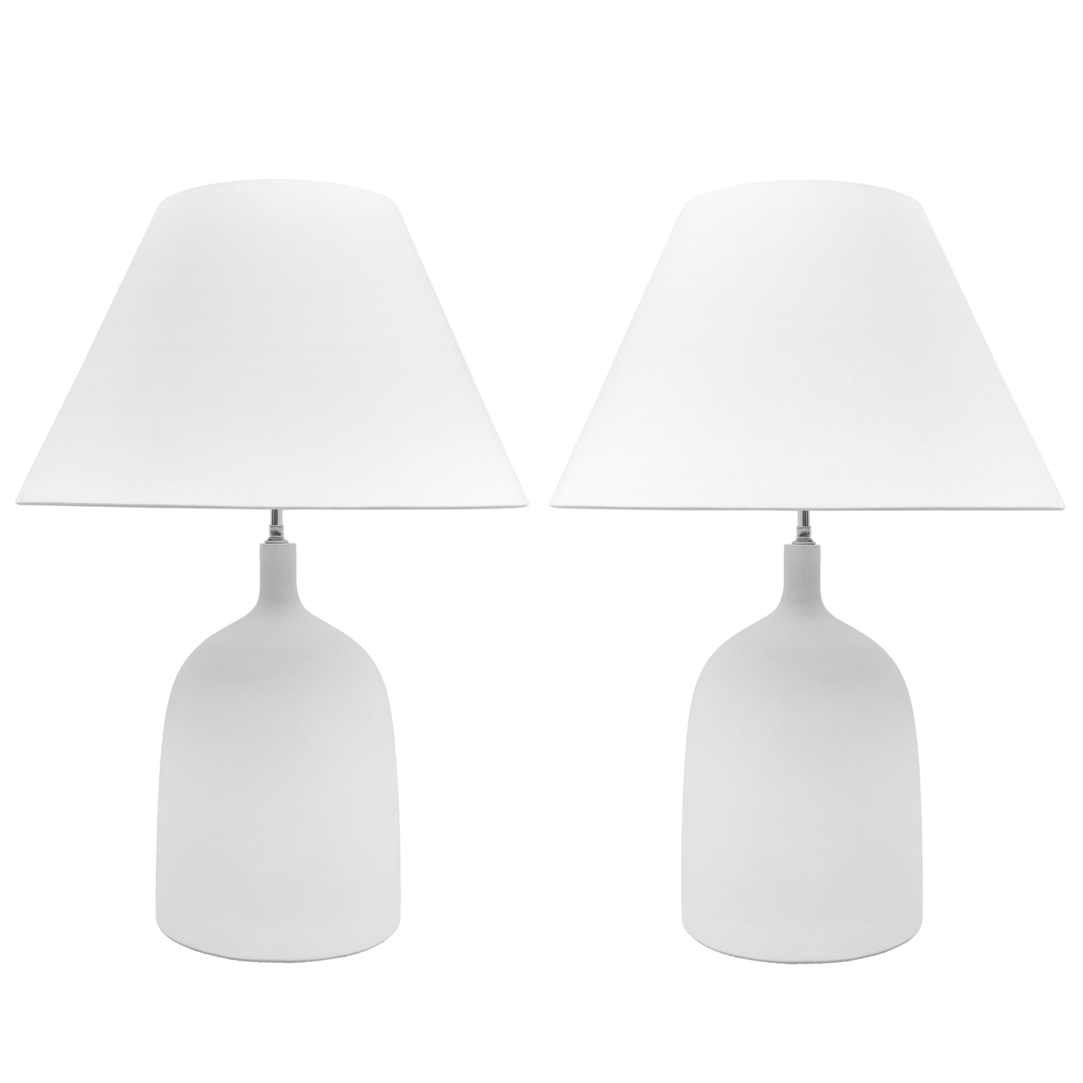 Pair of custom plaster Delphine lamps.
One pair currently in stock. Lampshades are not included.
Please note that these lamps are customizable in size, color, material.
Lead time is 8-10 weeks.
Measures: Height to tip of finial is 29.5