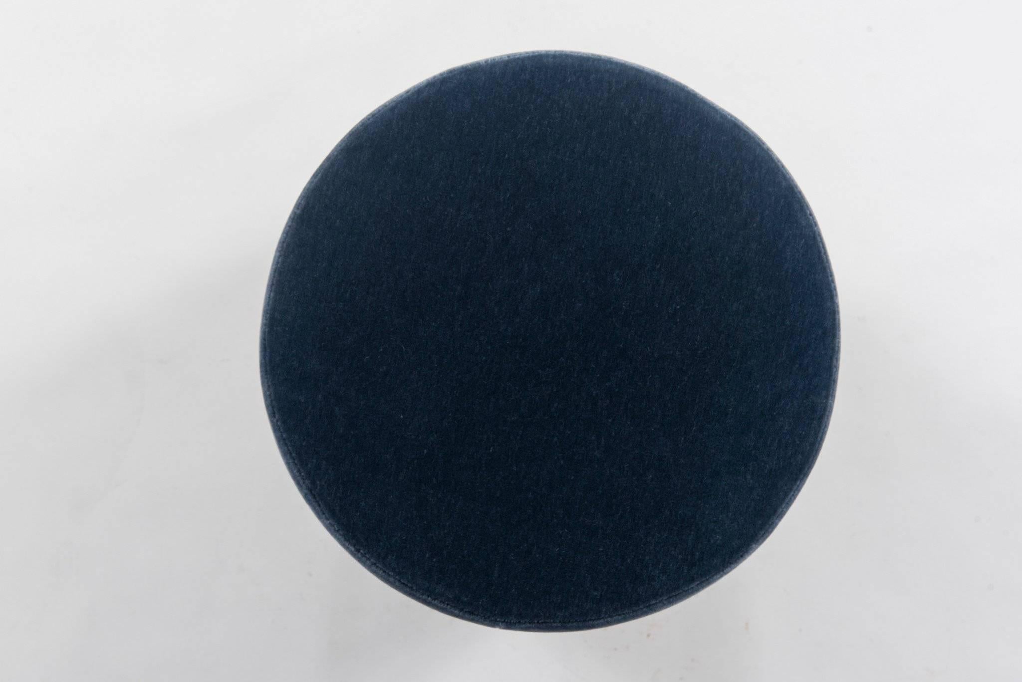 A pair of custom soldier blue mohair pouf seats with brass bases, also available C.O.M.