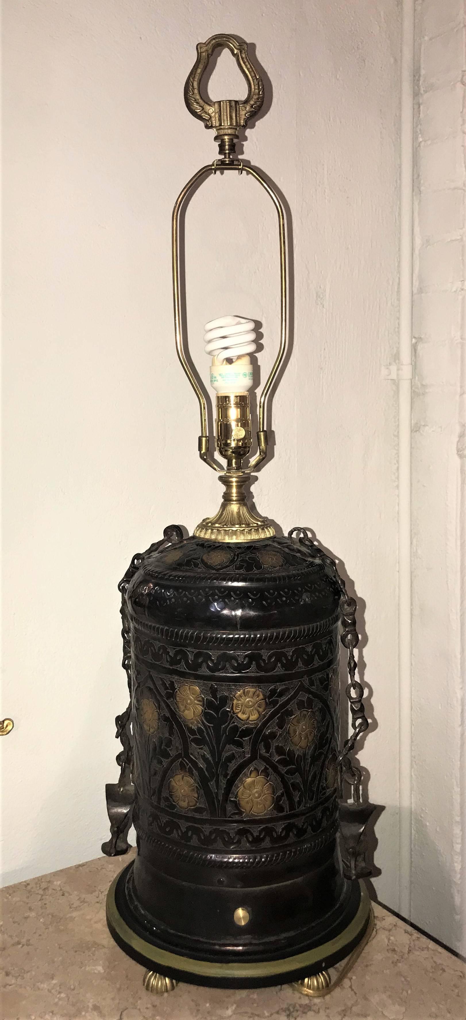 A pair of vintage brass and metal floral design urn table lamps. Each having an urn form shape constructed from all metal hand design with brass additions. Each lamp having a custom-made lampshade.