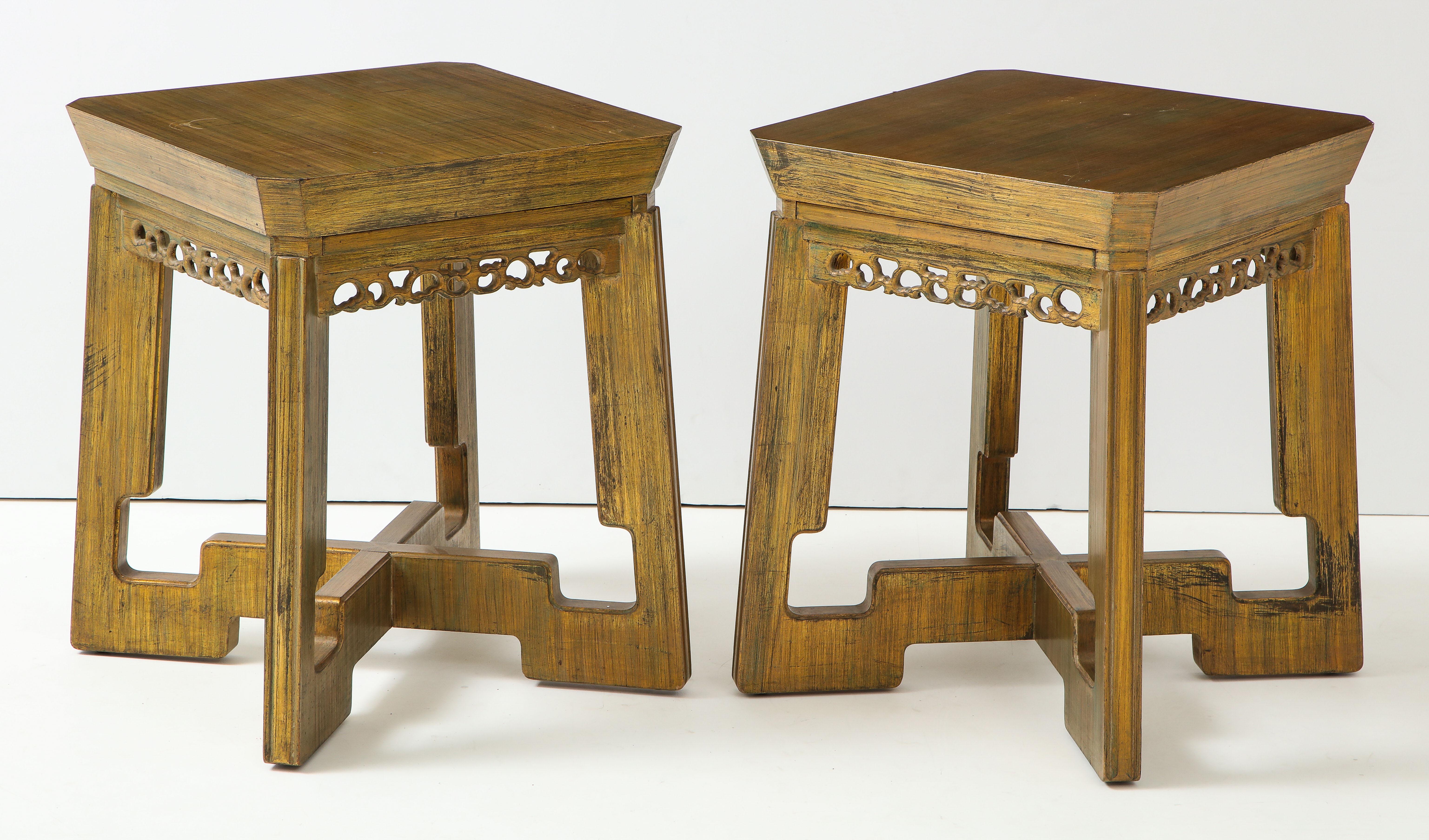 Pair of custom Asian influenced side tables / nightstands by James Mont.
The tables each have a pullout tray top and retain there original combed gilded finish which is in great condition.
They are branded James Mont Design.
  
