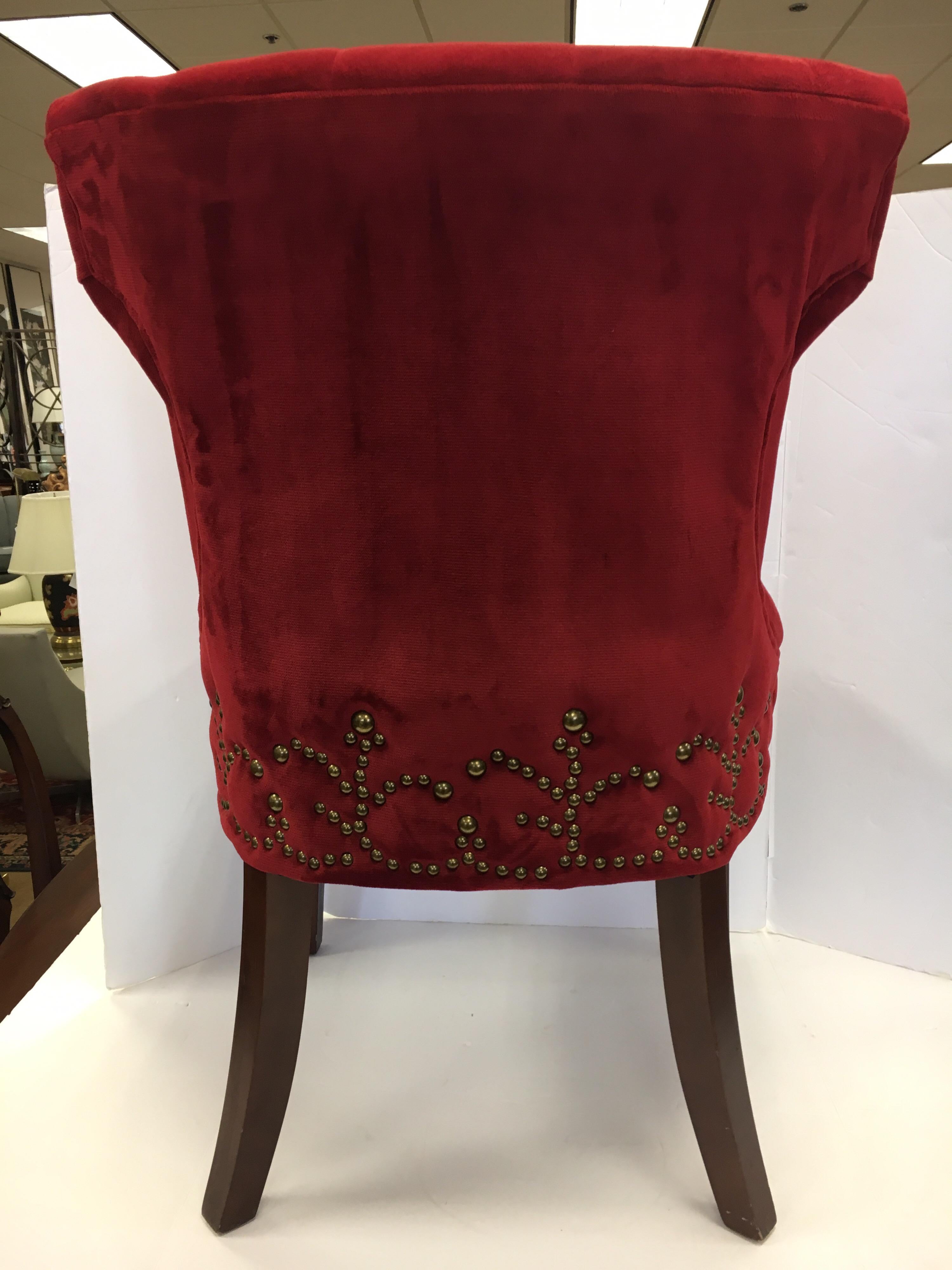 Stunning red cotton fabric upholstery on tufted dining chairs, a pair with one of a kind nailhead pattern throughout which looks like a work of art.