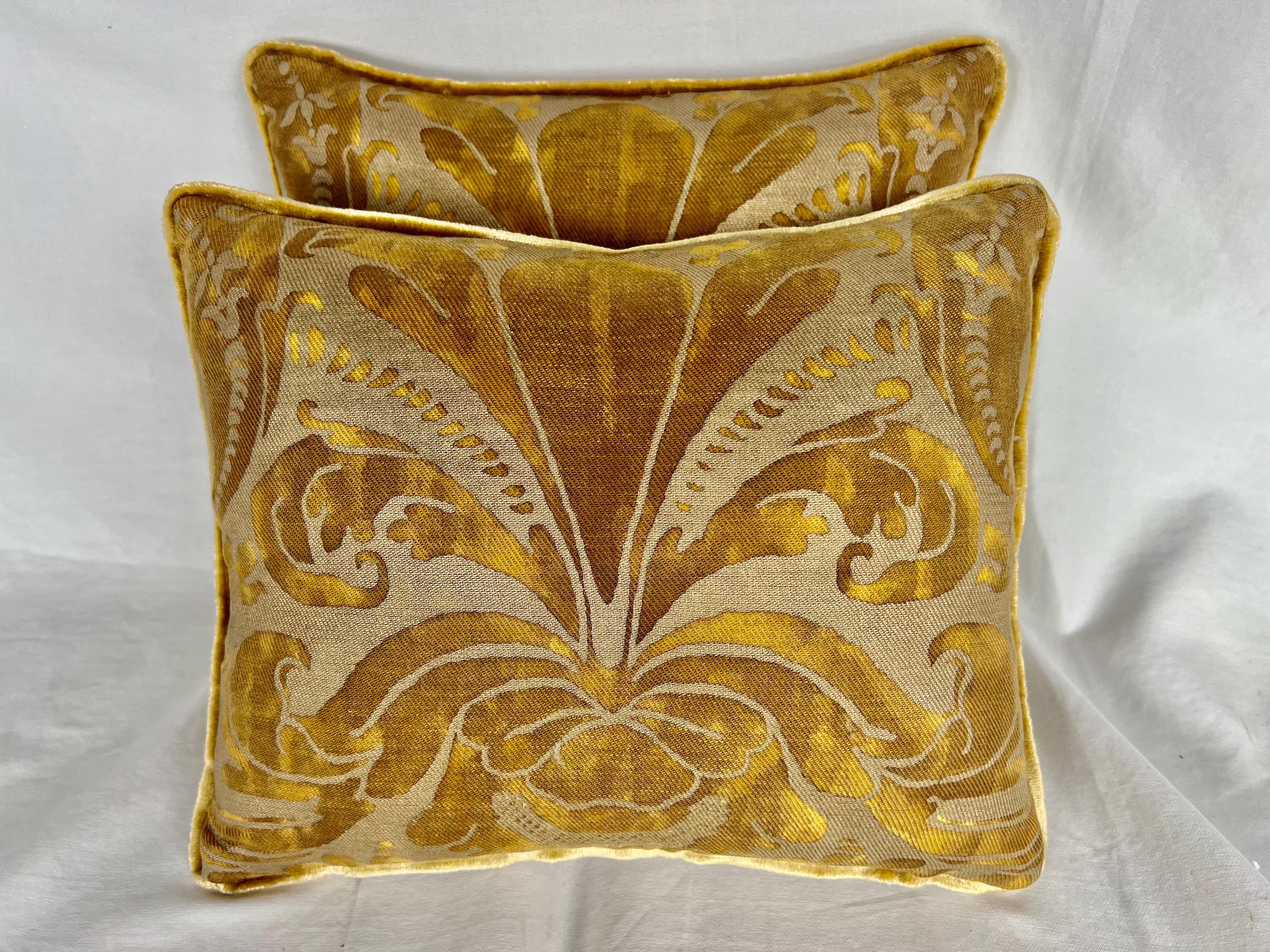 Pair of custom pillows made with vintage gold Fortuny textle fronts and golden velvet backs. Self welt, down inserts, zipper closures.