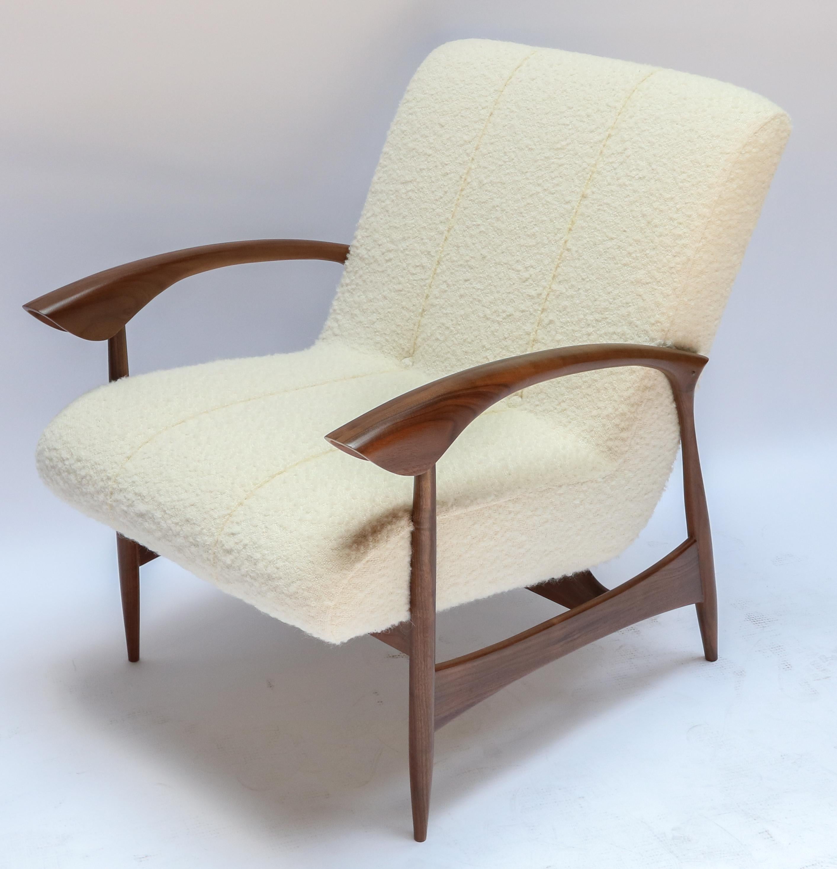 Pair of custom armchairs in American Walnut and Italian ivory boucle.  Made in Los Angeles by Adesso Imports. Can be done in different woods, finishes and fabrics.
