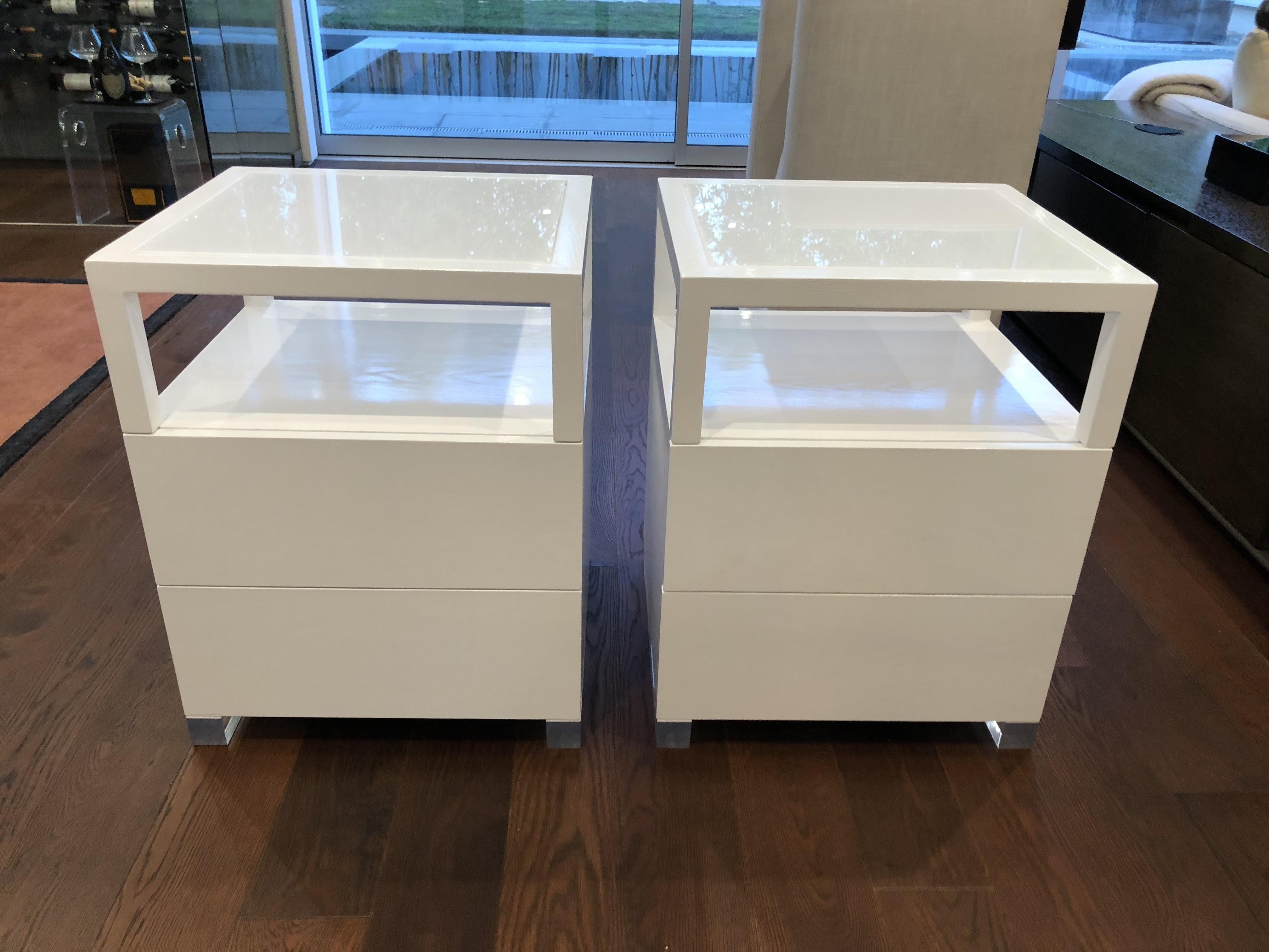 The price is per set of 2 nightstands.
Beautiful pair of nightstands made of solid white oak and Lucite with a transparent Lucite tops.
The pieces have beautiful lines and great presence, they are solidly built and crafted locally.
The nightstands