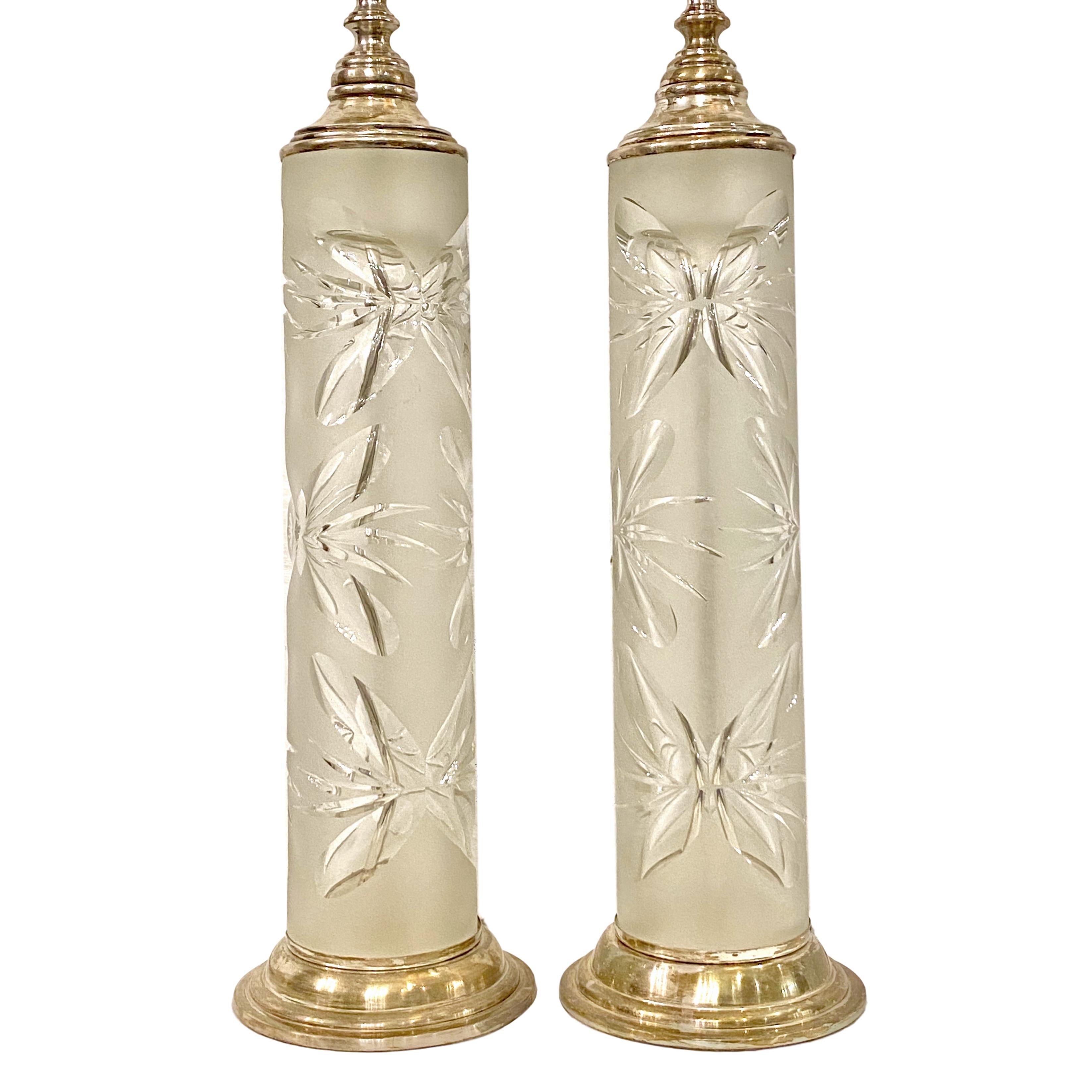 A pair of circa 1940s French cut glass table lamps with silvered fittings.

Measurements:
Height of body 18
