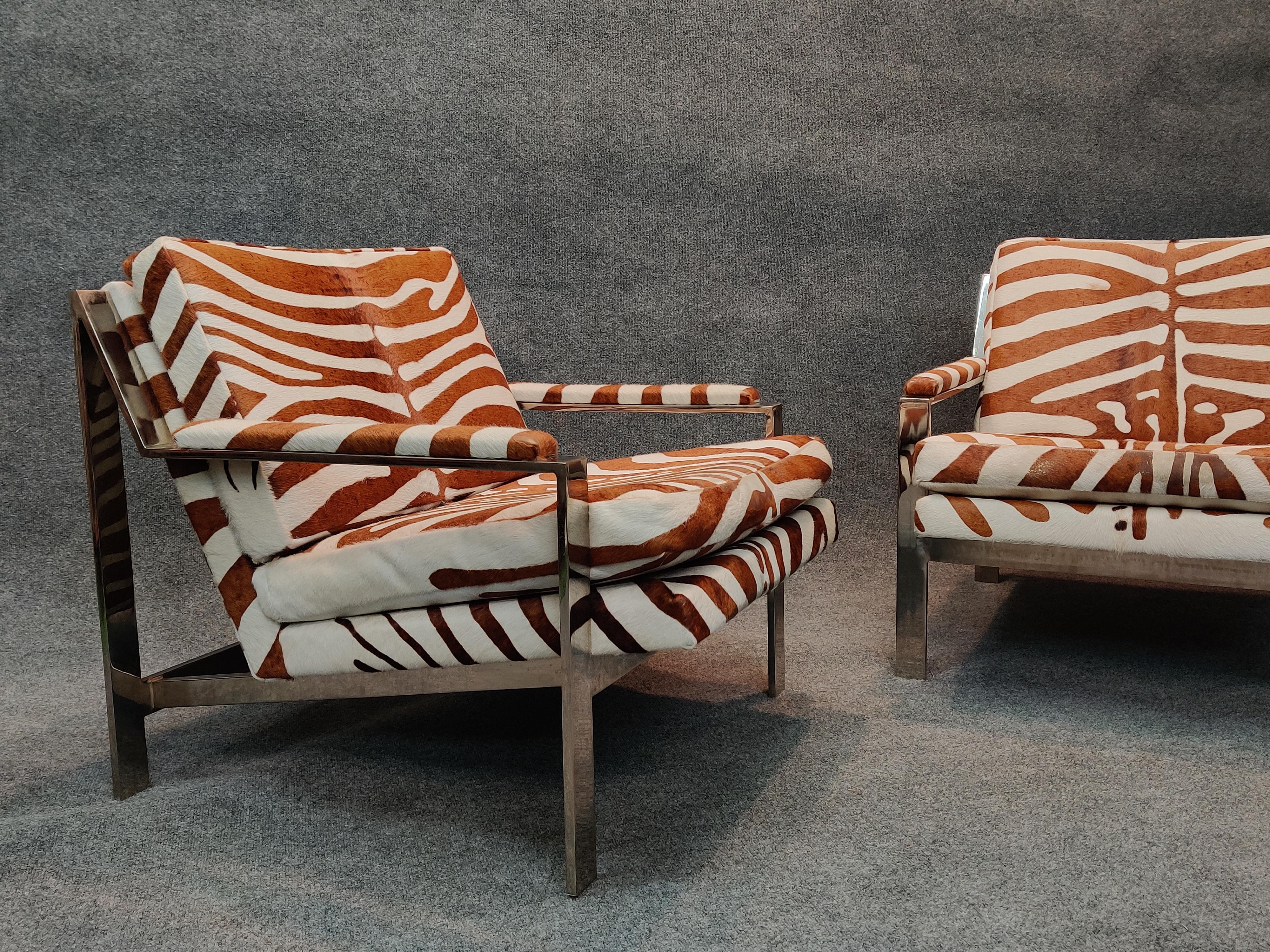 American Pair of Cy Mann Attributed Flat Bar Lounge Chairs in Cowhide