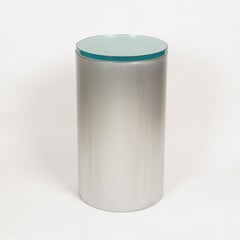 Pair of cylindrical brushed chrome metal and glass end tables