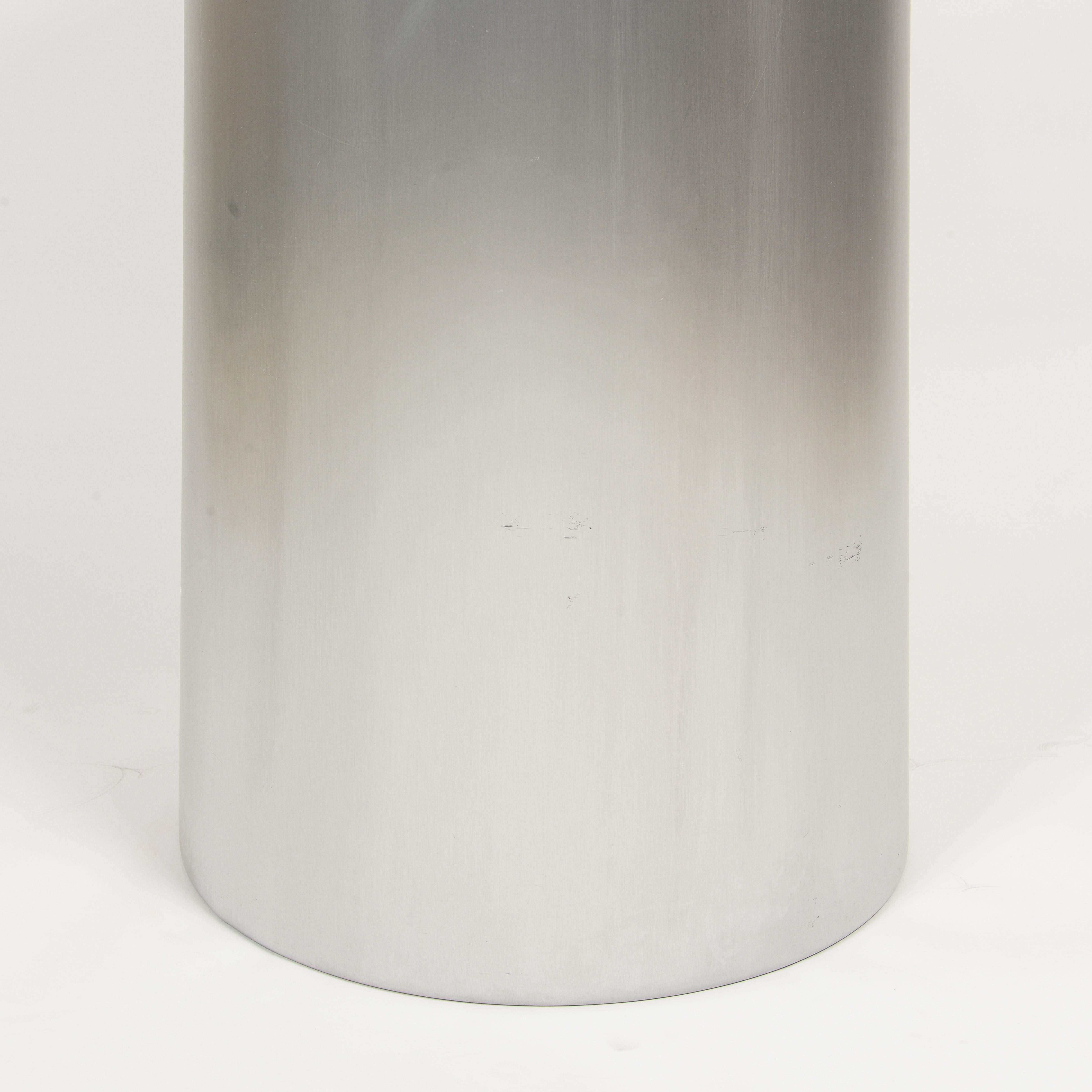 Late 20th Century Pair of cylindrical brushed chrome metal and glass end tables For Sale