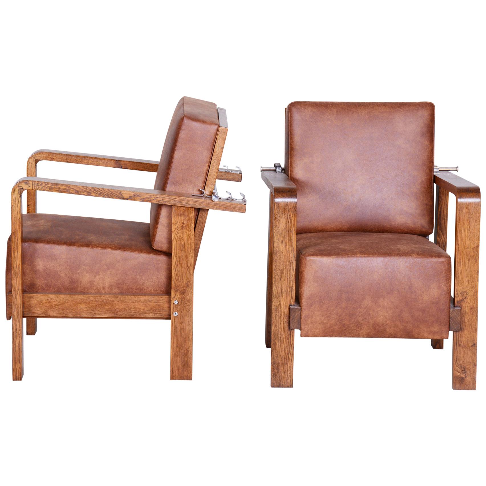Pair of Czech Adjustable Functionalist Leather and Oak Armchairs, 1930s