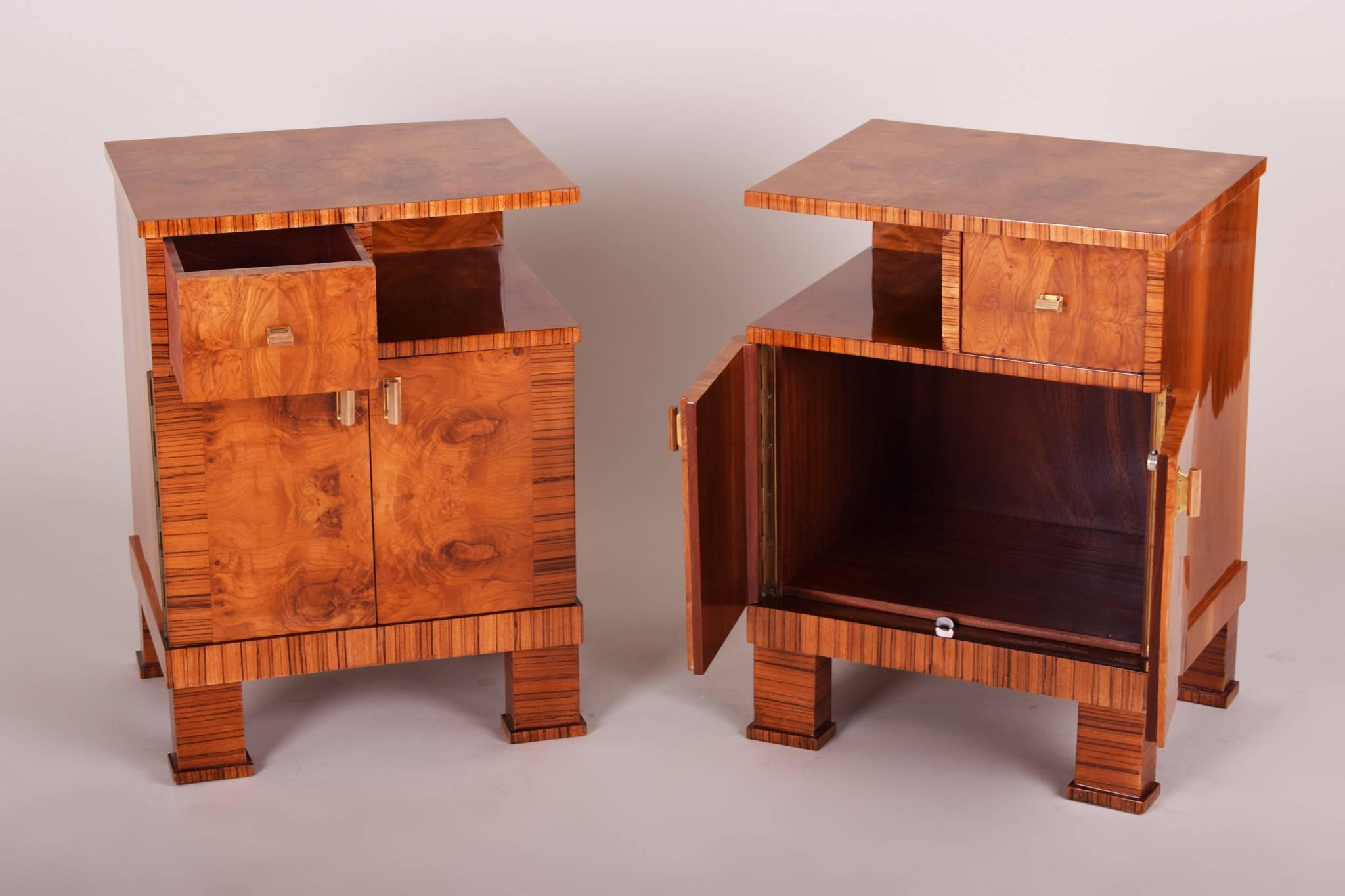 Pair of Art Deco bed-side tables from Czech Republic.
Completely restored, surface polished by piano lacquers to the high gloss.
Material: Walnut, elm Zebrano.
