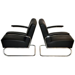 Pair of Czech Chairs with Curved Chrome Legs