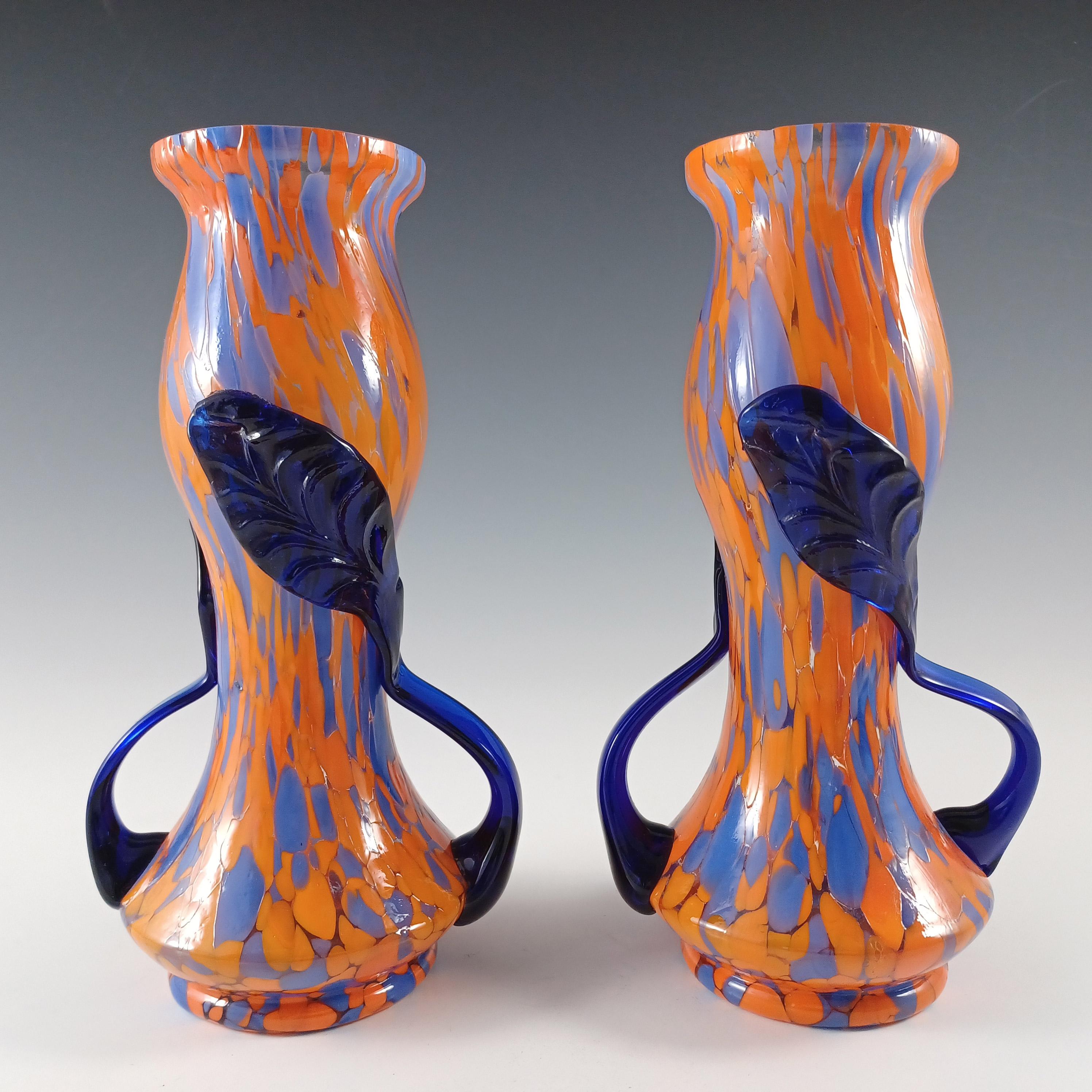 A superb pair of 1930's Czech/Bohemian orange and blue spatter glass vase, with applied dark blue decoration.

Size
Measure approx 8 inches tall by 4.25 inches in diameter at widest point.

Condition
Excellent condition, no chips or cracks other