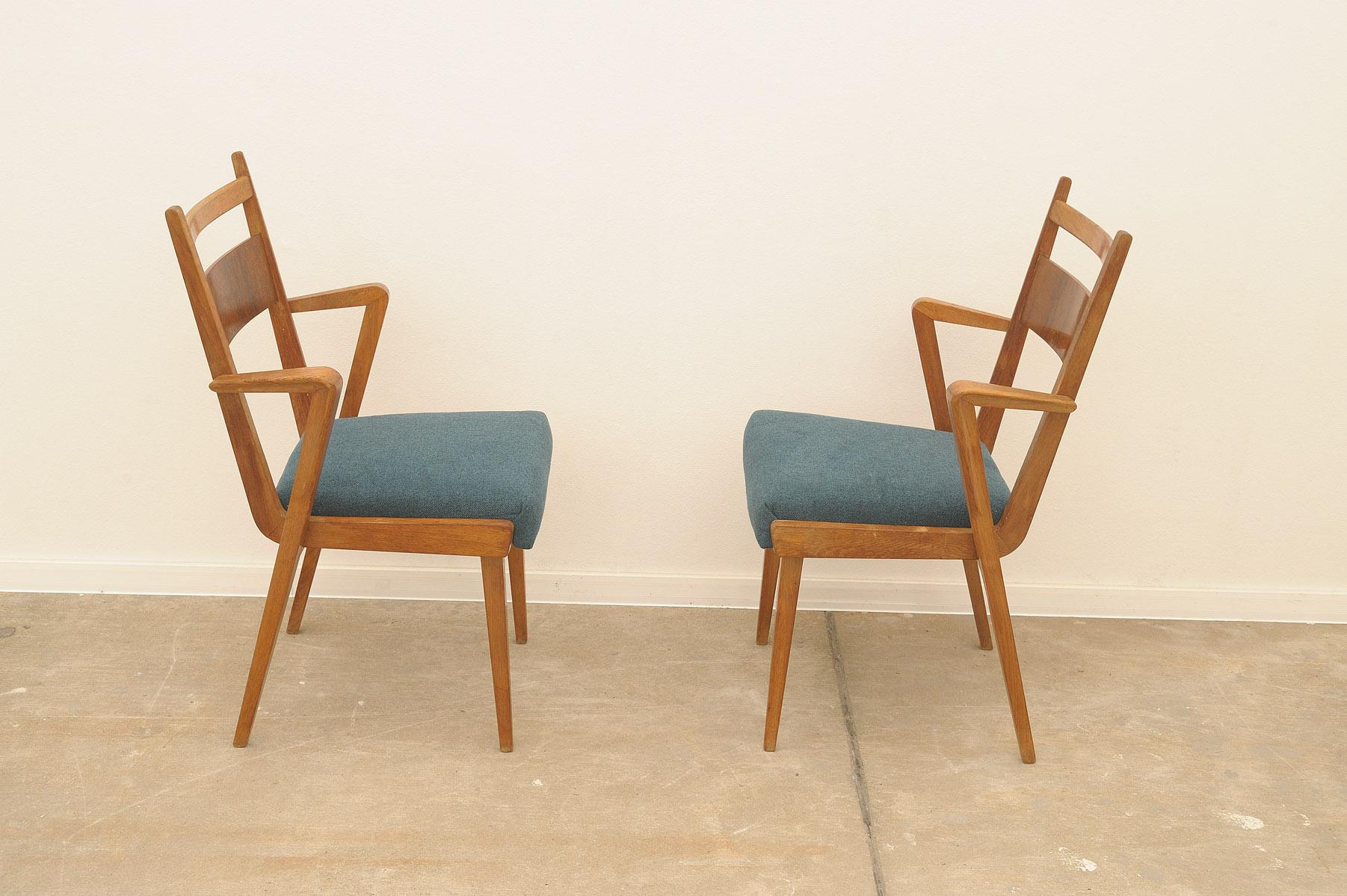 Pair of upholstered bentwood chairs by Jitona company. They were made in the former Czechoslovakia in the 1970´s. It features beech wooden structure and upholstered seat. The chairs are in good original condition, have a new fabric and wood shows