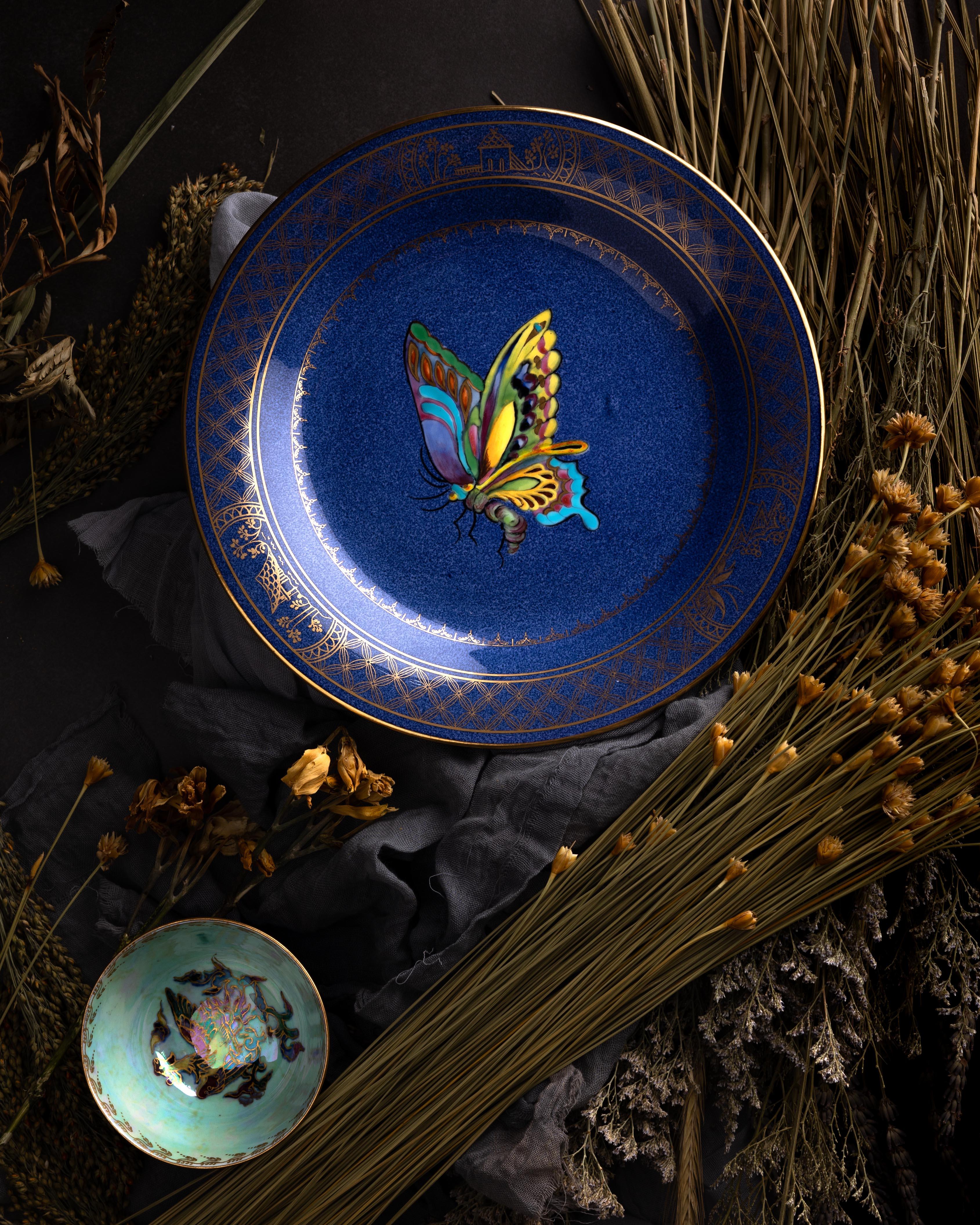A pair of powder blue ‘Butterfly’ plates designed by Daisy Makeig-Jones for Wedgwood, circa 1920.

These whimsical plates are just gorgeous, featuring beautifully polychromed butterflies for a colorful adaptation of Daisy Makeig-Jones’s