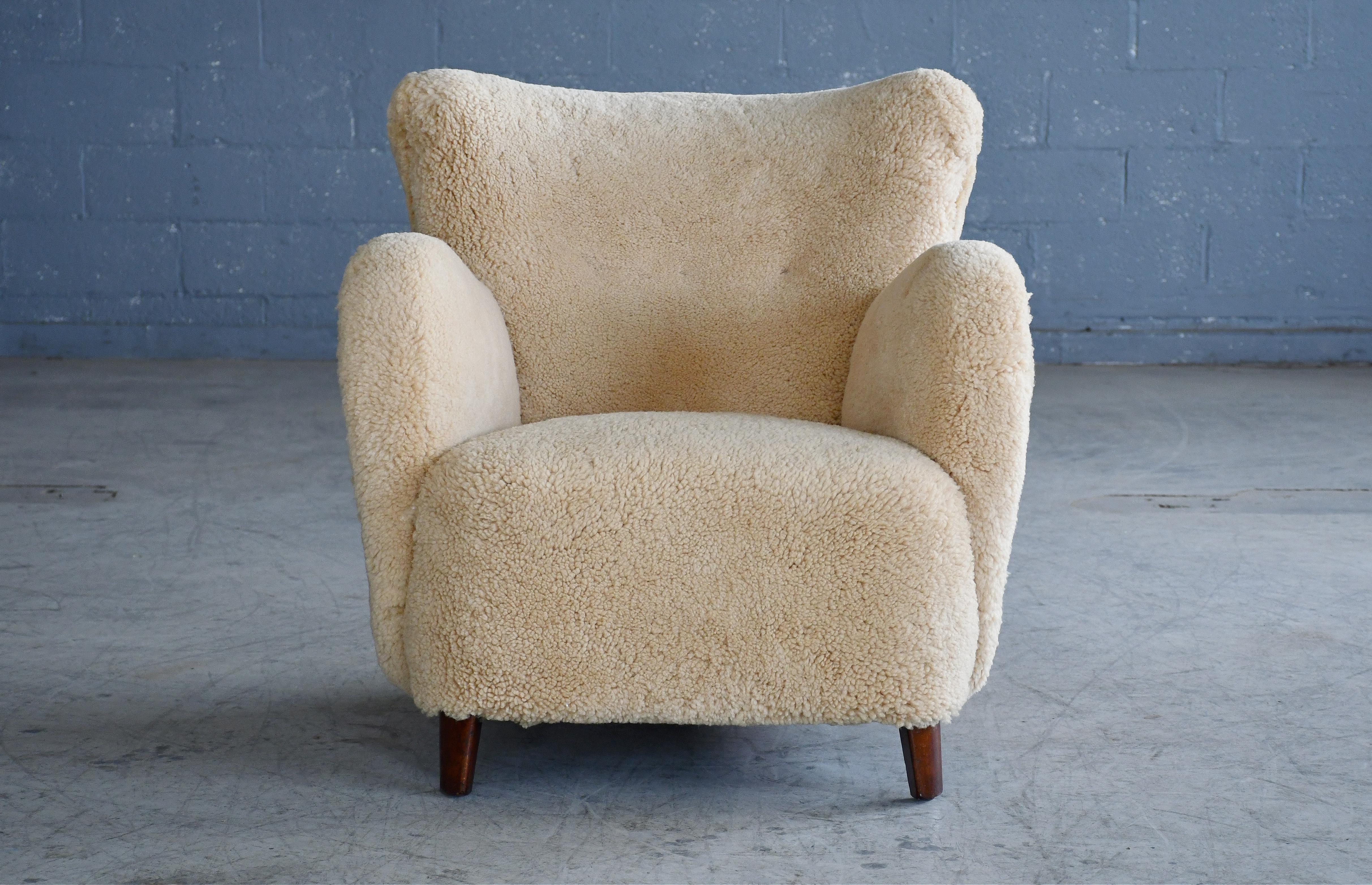 Mid-20th Century Pair of Danish 1940's Classic Club or Lounge Chairs in Amber Color Shearling