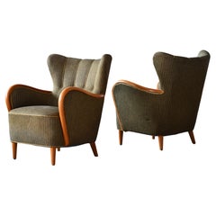 Pair of  Danish 1940s Lounge Chairs with Carved Armrests Accents in Oak