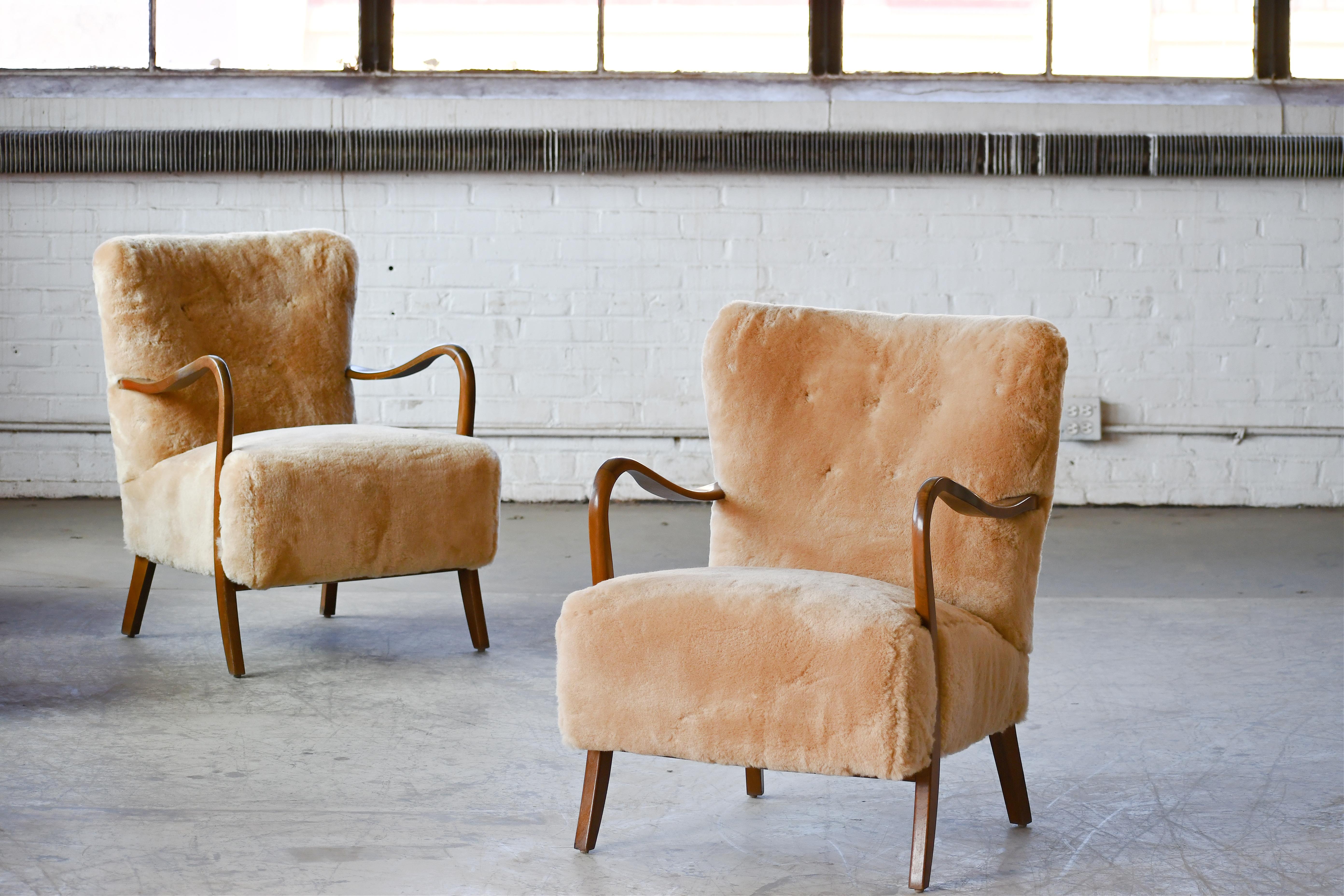 Mid-20th Century Pair of Danish 1940s Low Back Easy Chairs in Amber Shearling with Open Armrests
