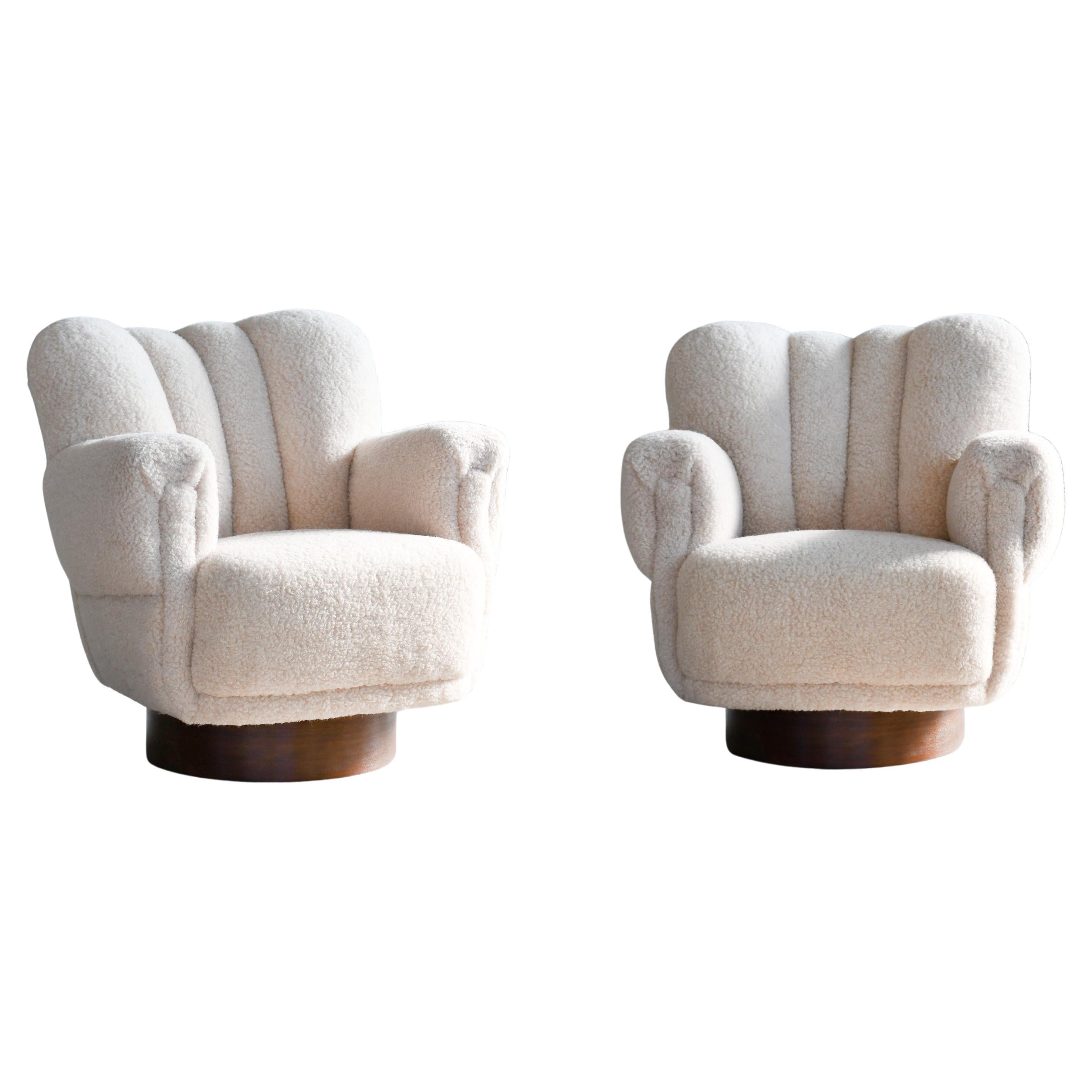 Pair of Danish 1940s Mid-size Low Back Swivel Base Lounge Chairs