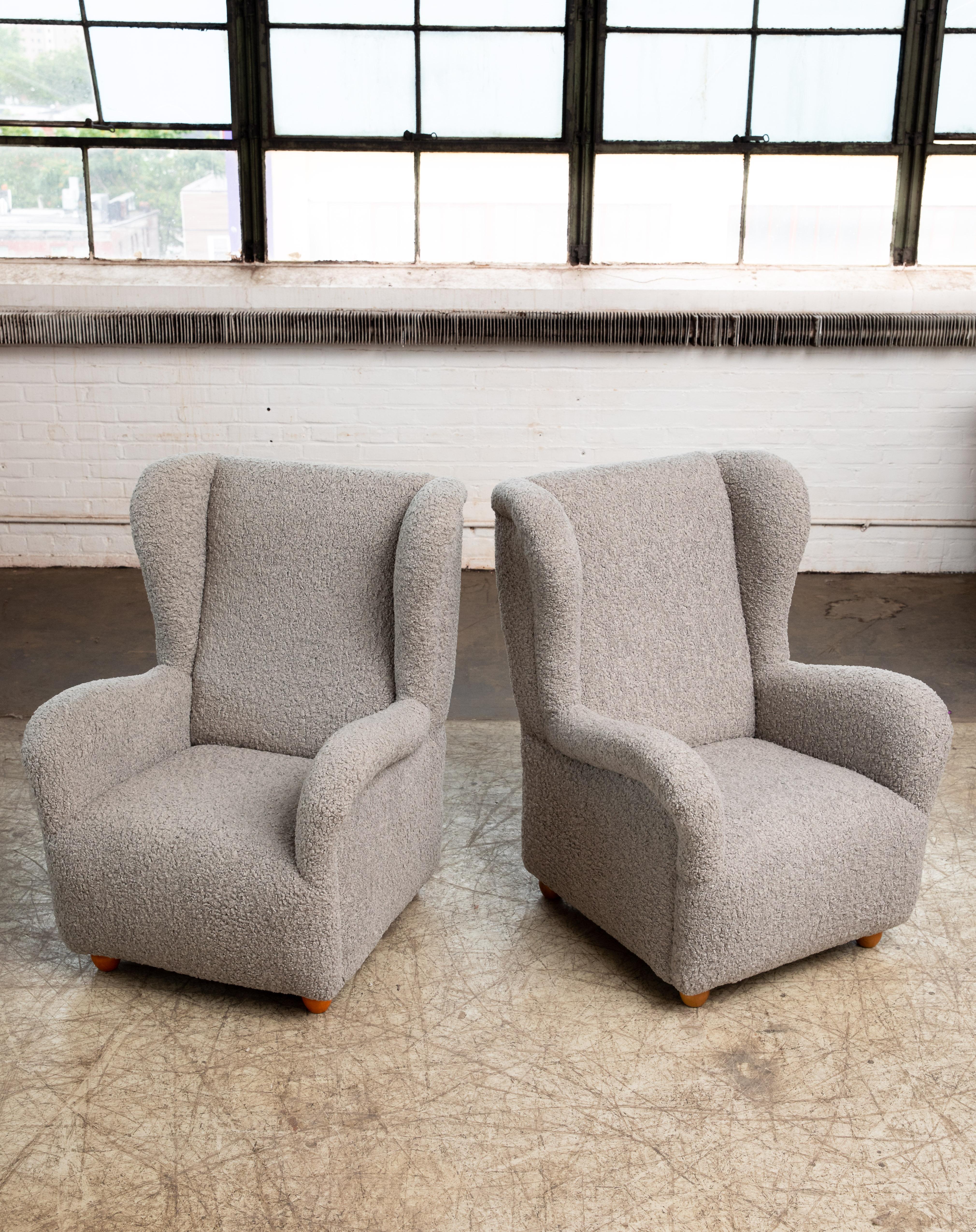 Pair of great large scale Danish club or lounge chair of newer fabrication in the style of 1940's chairs but likely made around 2000. We found the chairs in Denmark and based on the looks they appeared to be 1940's but upon closer review we found