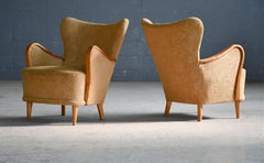 Pair of Danish 1950s Lounge Chairs with Carved Armrests in Beech