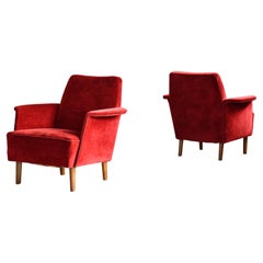 Pair of Danish 1950's Low Lounge chairs with Oak Legs