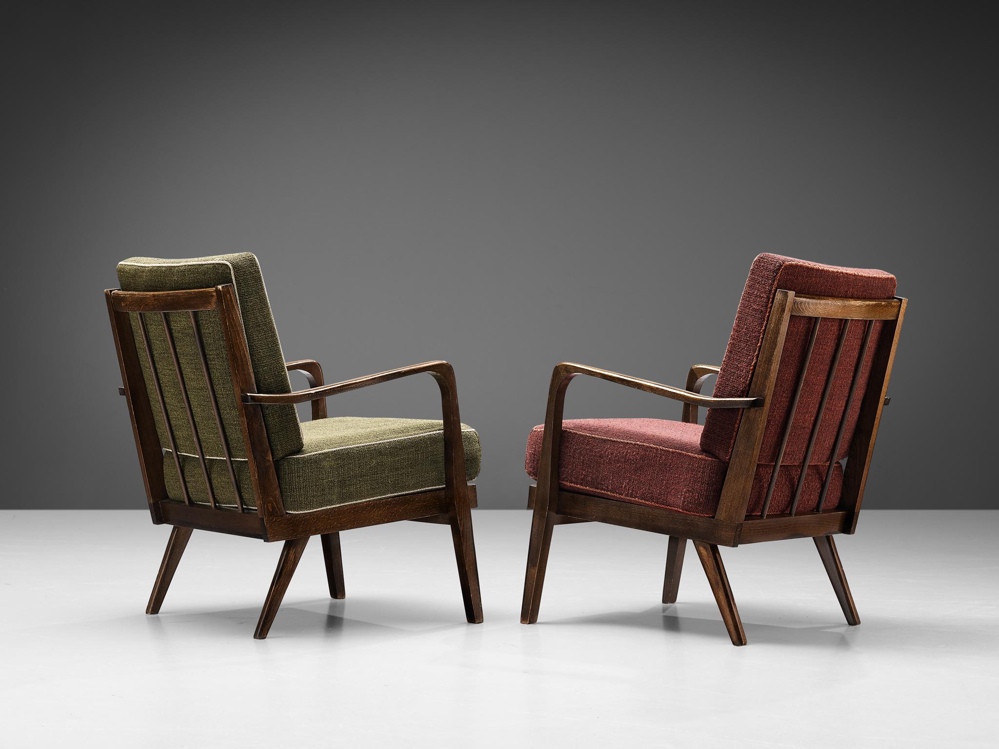 Pair of lounge chairs, fabric, stained wood, Denmark, 1950s.

This stately and well-executed Danish high back chairs show an exquisite level of craftsmanship. The lines and finishes in this set are both curvy and crisp. The frame shows traits of the