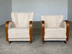 Pair of Danish Art Deco Lounge Chairs with Sculptural Curved Arms, 1940s–1950s