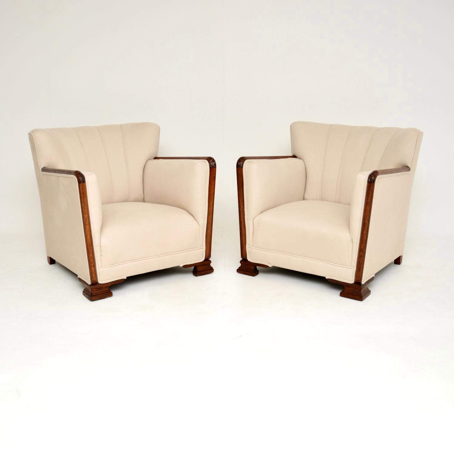 A beautiful and impressive pair of Danish Art Deco period armchairs. They were recently imported from Denmark, and date from the 1930’s.

The quality is outstanding, they are extremely comfortable with very generous proportions. The carved oak