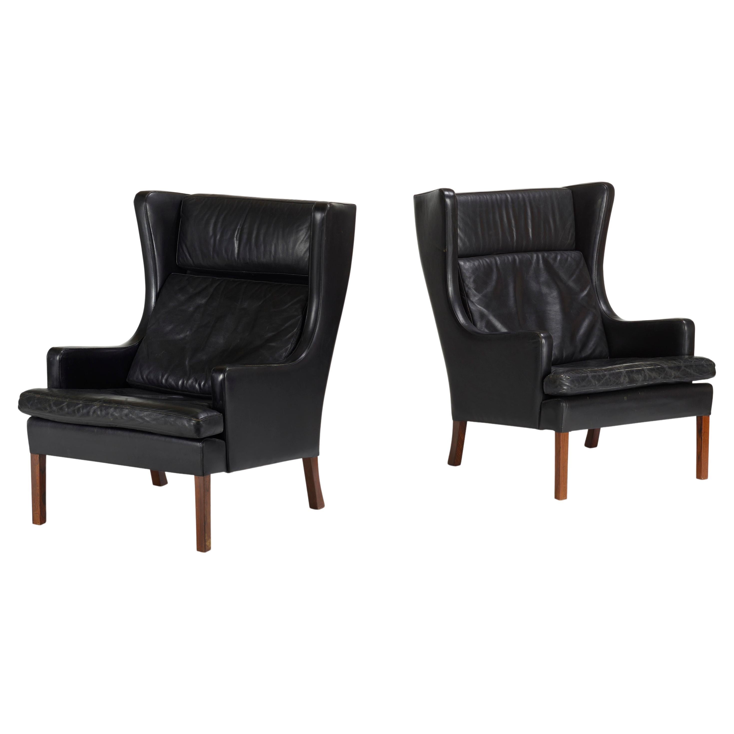 Pair of Danish Black Leather Upholstered Wingback Chairs For Sale