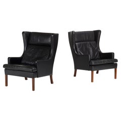 Pair of Danish Black Leather Upholstered Wingback Chairs