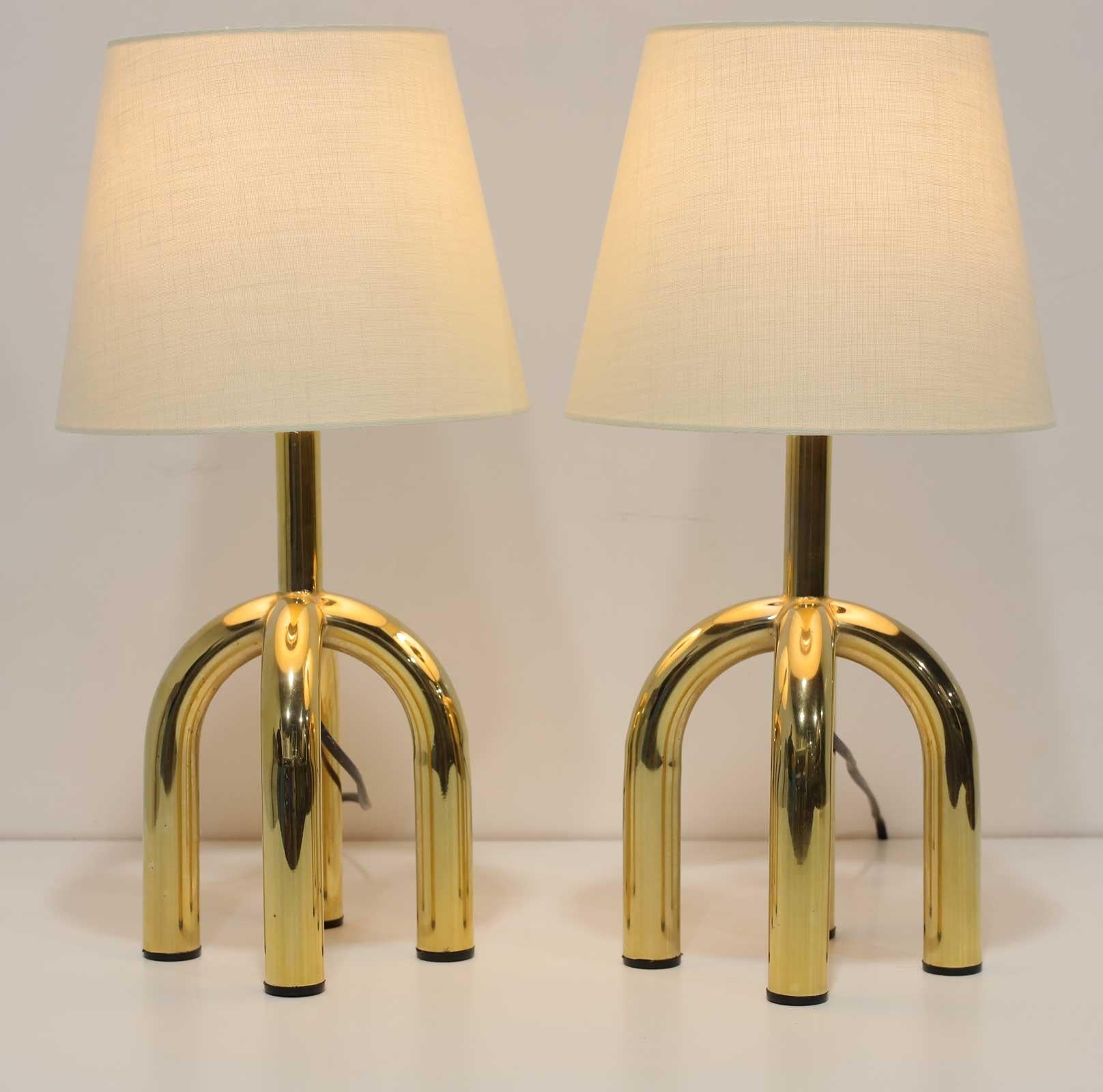 A unique pair of Danish brass finish lamps, 1980s. Linen shades.