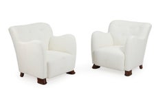 Paire de fauteuils de design danois tapissés Light Boucle. Suède, années 1940