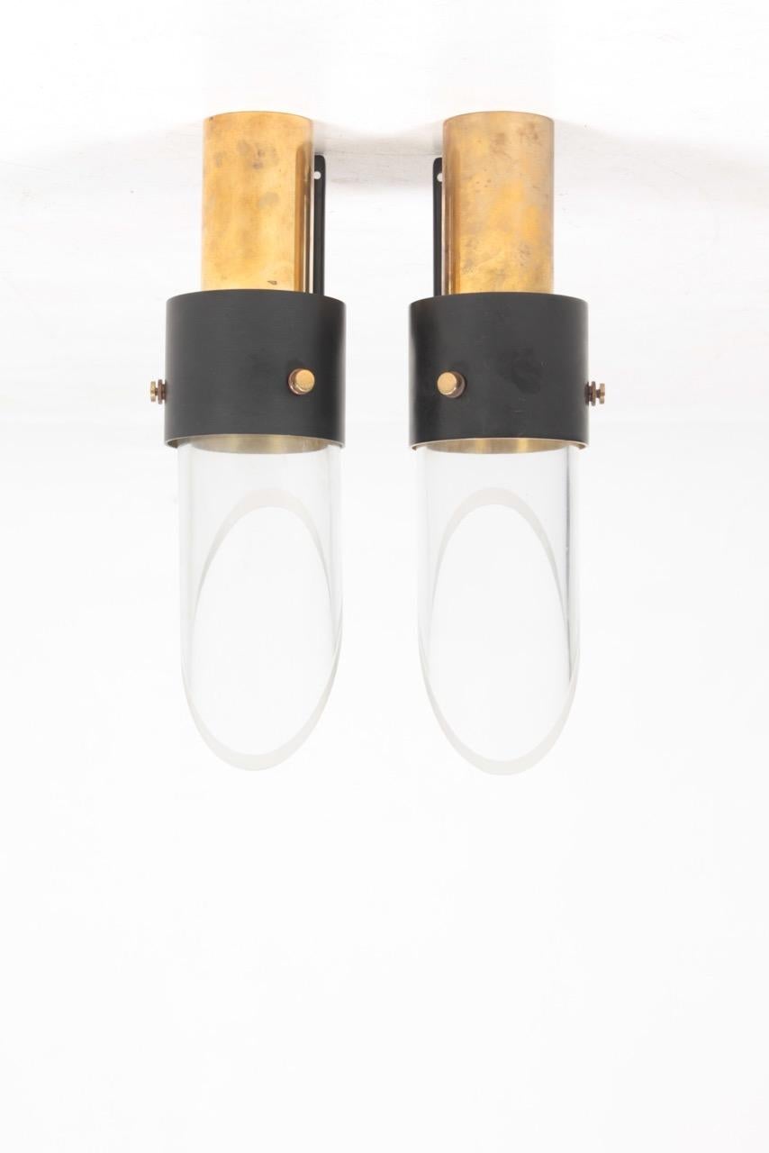 Pair of wall sconces in outstanding quality, designed by MAA. Kay Kørping for Lyfa Denmark. Great original condition.