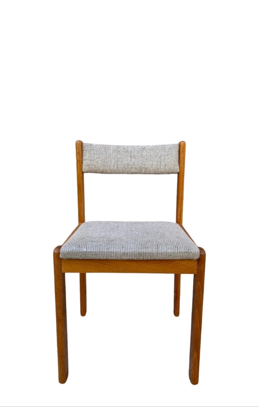 A Pair of Vintage Danish Mid Century Modern Upholstered Dining Chairs by Findahls Mobler Denmark circa 1970s production. In good vintage condition with minor losses and wear consistent with age and use. Stamped Made in Denmark. Sleek teak wood frame