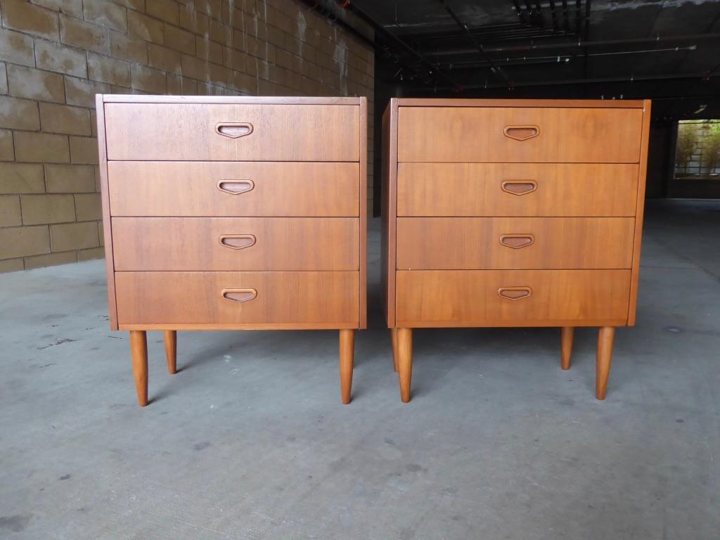 A desirable pair of Danish four-drawer teak wood bedside chests from the 1960s. Pairs of bedside chests are difficult to find and this pair is in excellent original condition.