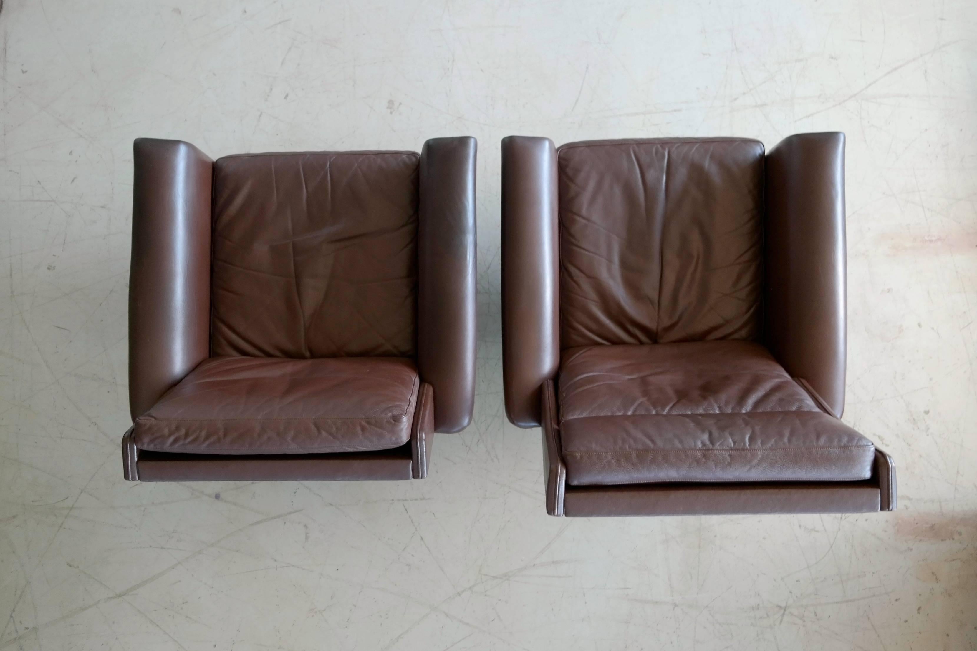 Pair of Danish High Low Swivel Lounge Chairs in Chocolate Leather by Georg Thams 4