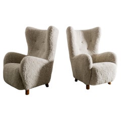 Pair of Danish High Wingback Sheepskin Chairs by Mogens Lassen Produced, 1940s