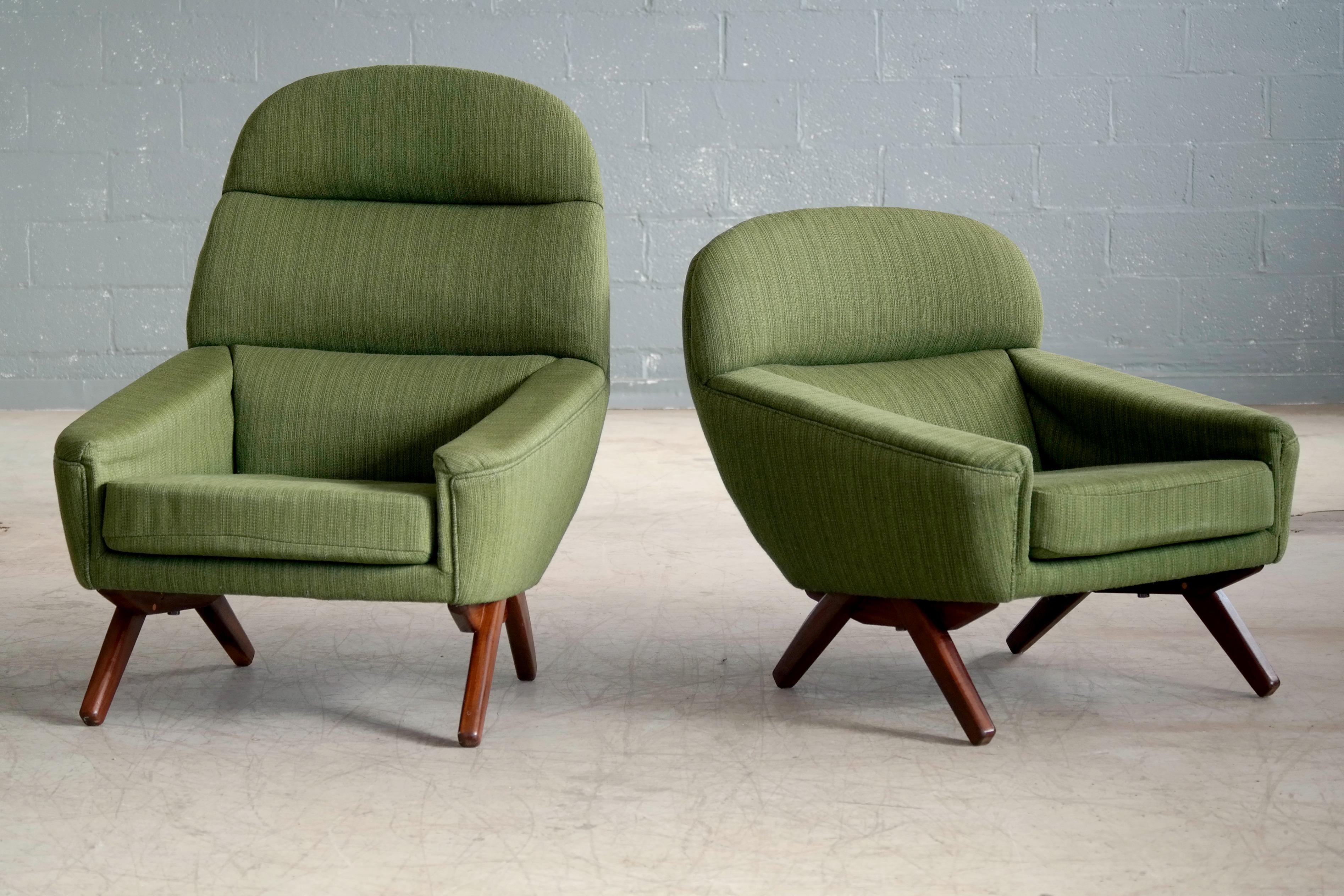 The spectacular design and rounded forms and scissor style base of these Leif Hansen designed chairs is very reminiscent one of Illum Wikkelso's most coveted designs the ML 91 chair. One difference is that Hansen's chairs have loose spring loaded