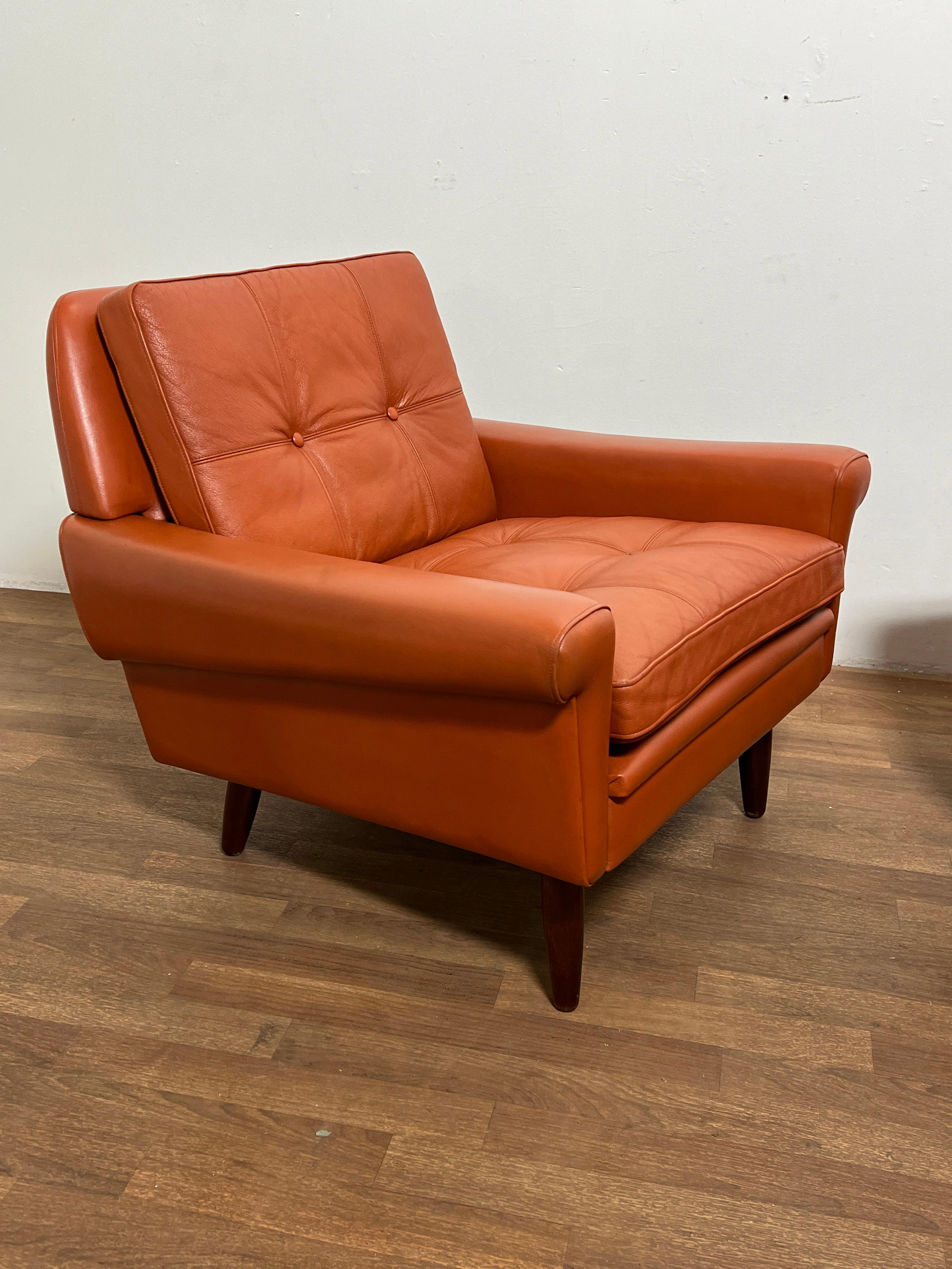 A pair of 1960s lounge chairs in original cognac leather by Svend Skipper Mobelfabrik, Denmark.