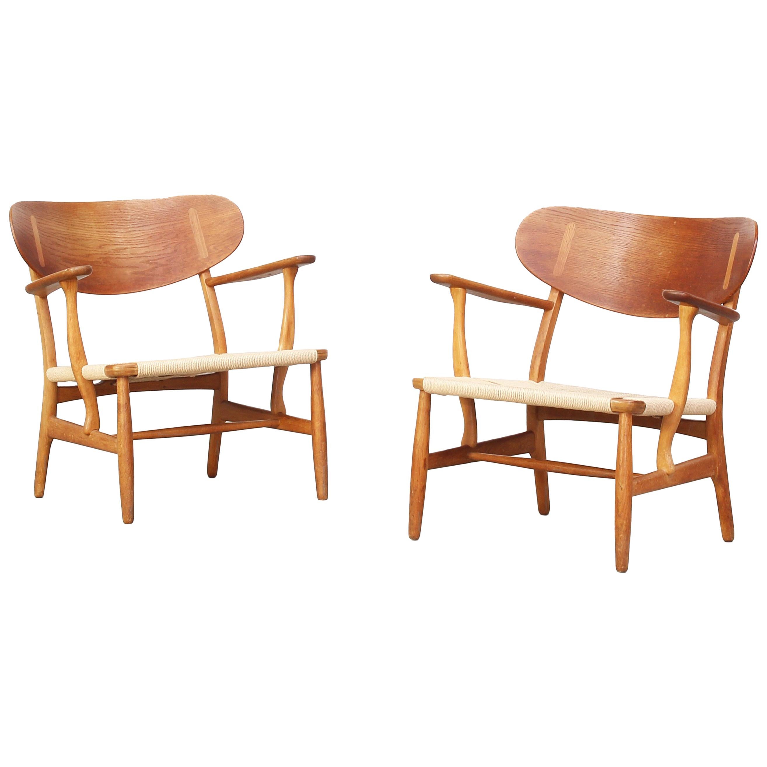 Pair of Danish Lounge Chairs by Hans J. Wegner for Carl Hansen CH 22 Oak