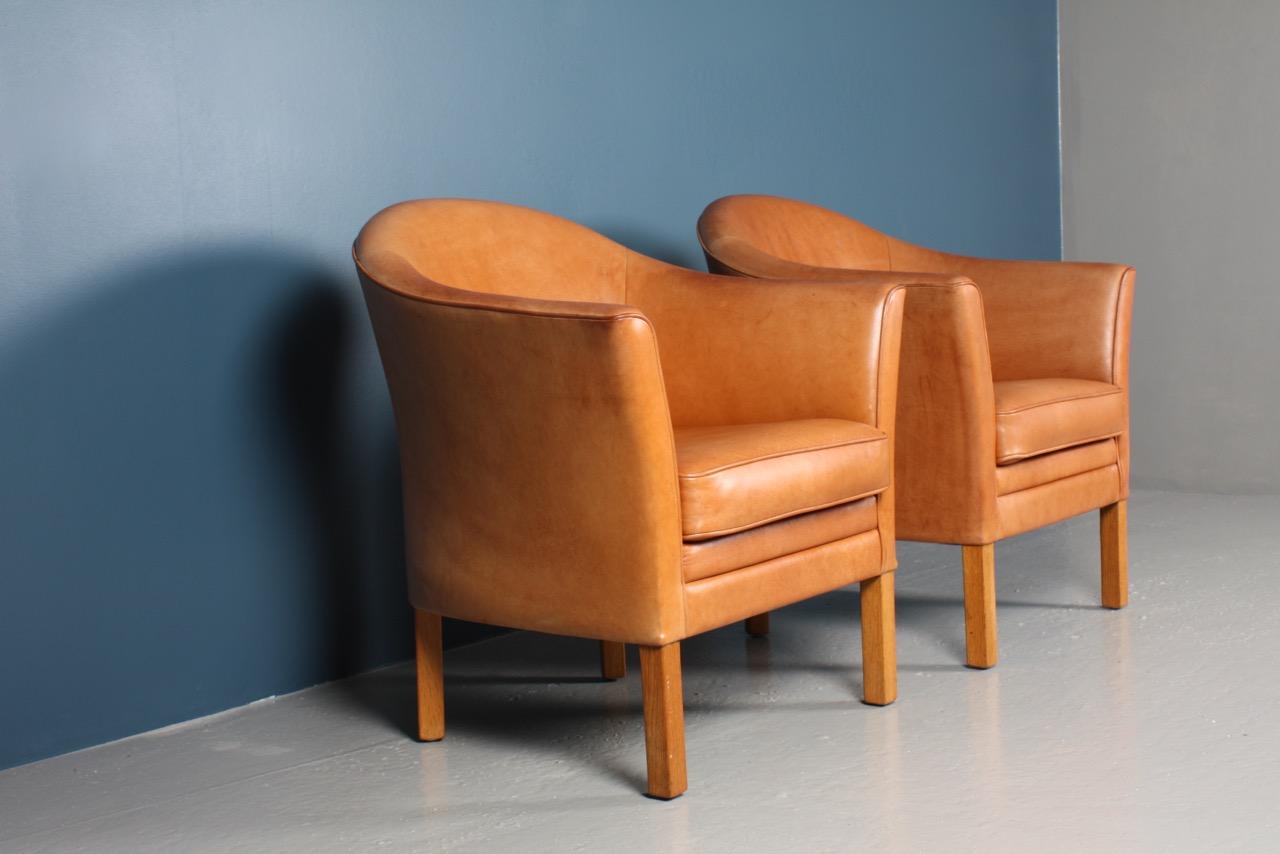 Scandinavian Modern Pair of Danish Lounge Chairs in Patinated Leather Designed by Lars Kalmar