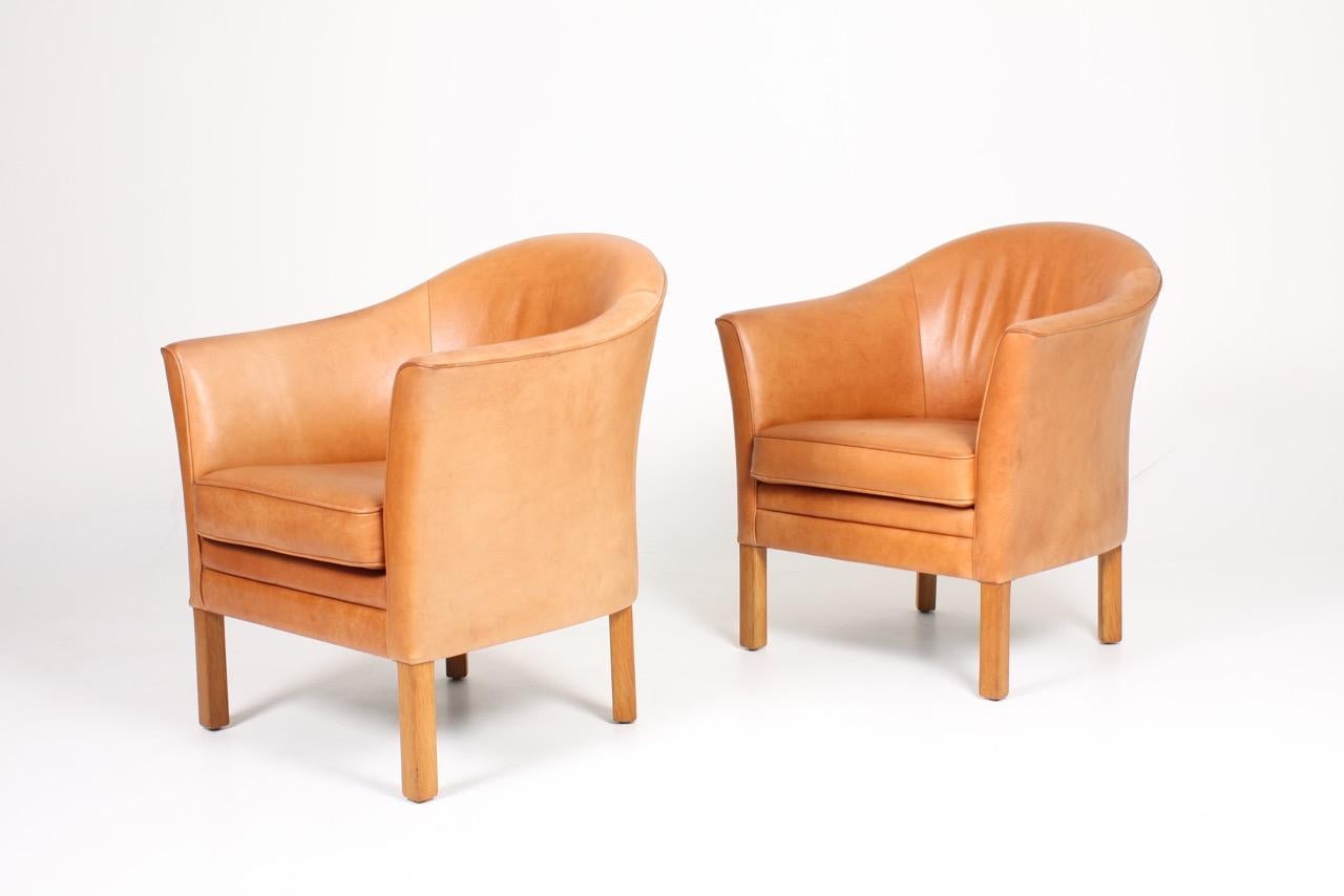 Late 20th Century Pair of Danish Lounge Chairs in Patinated Leather Designed by Lars Kalmar